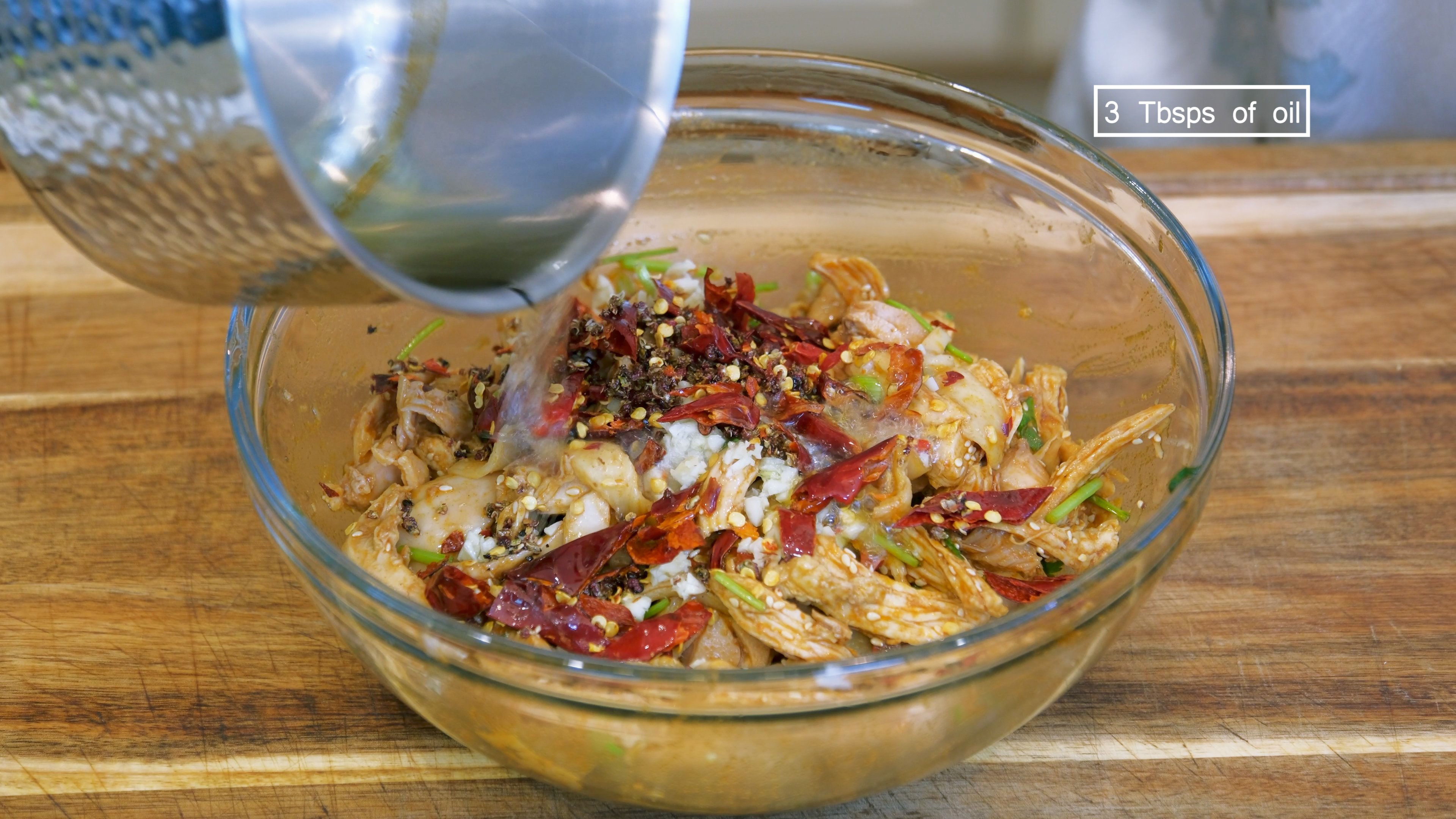 Image of Place the chicken into a big serving bowl. Add diced scallions and...