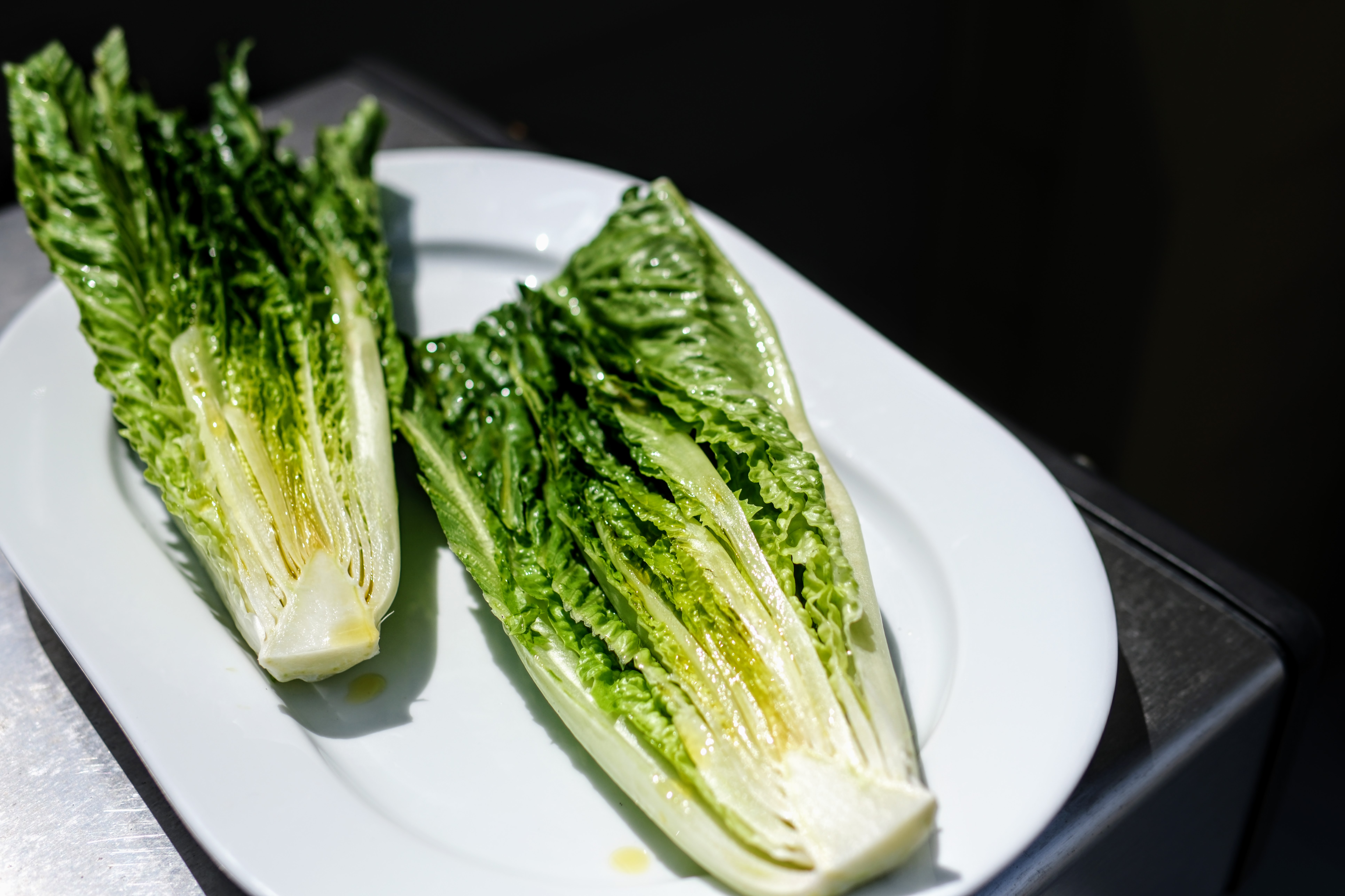 Image of Wash Romaine Lettuce well.  Cut a thin slice off of...