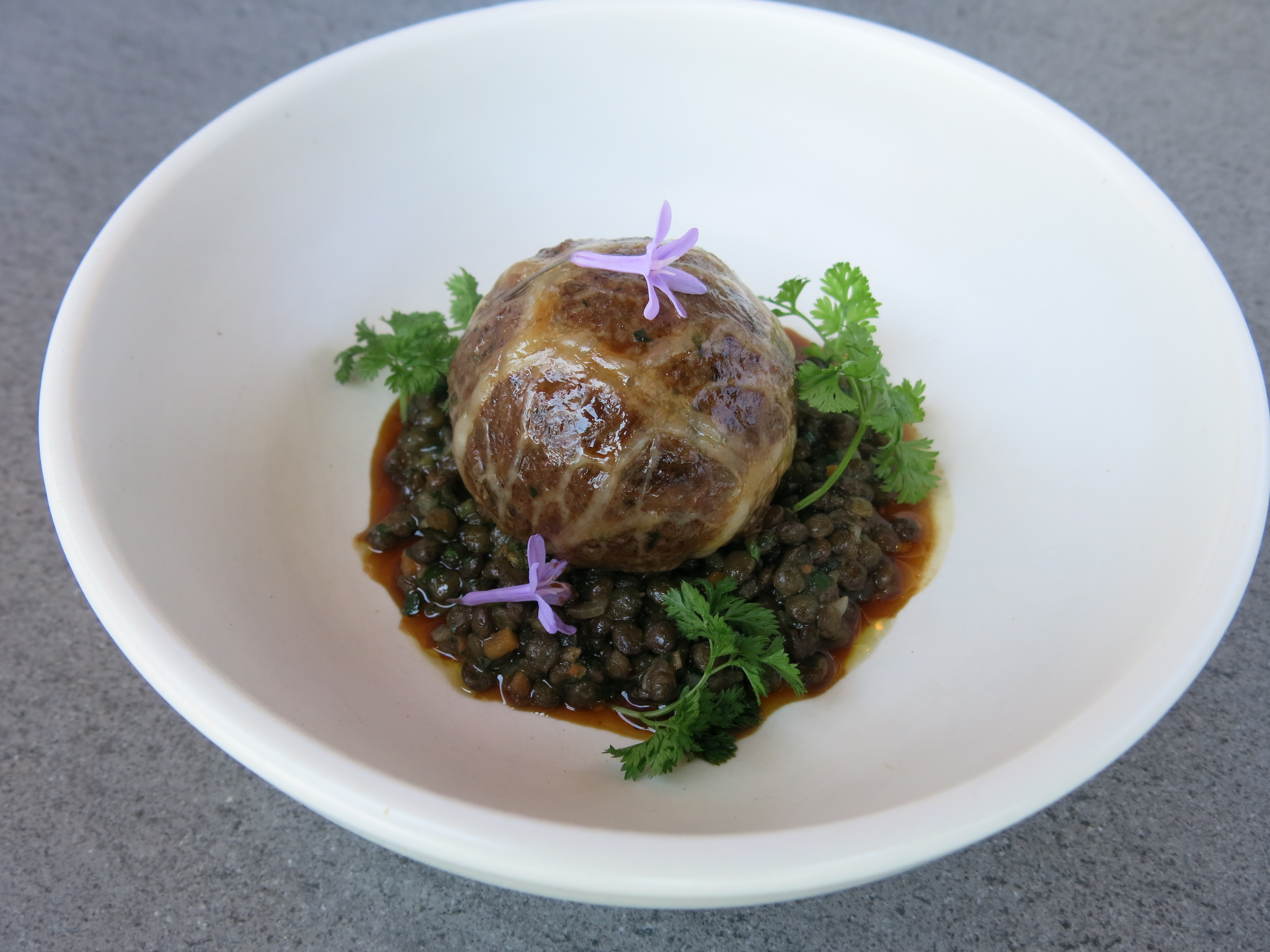 venison crépinette with french style fine green lentils