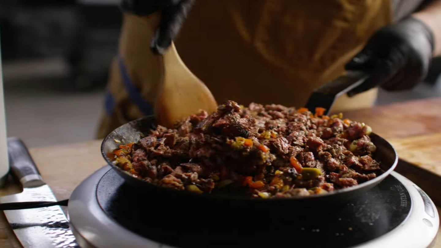 Image of Add the chopped beef to the vegetable mixture and mix...