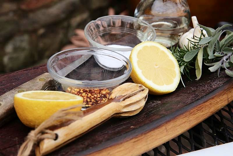 Image of  In a bowl mix the coarsely chopped rosemary, sage and...