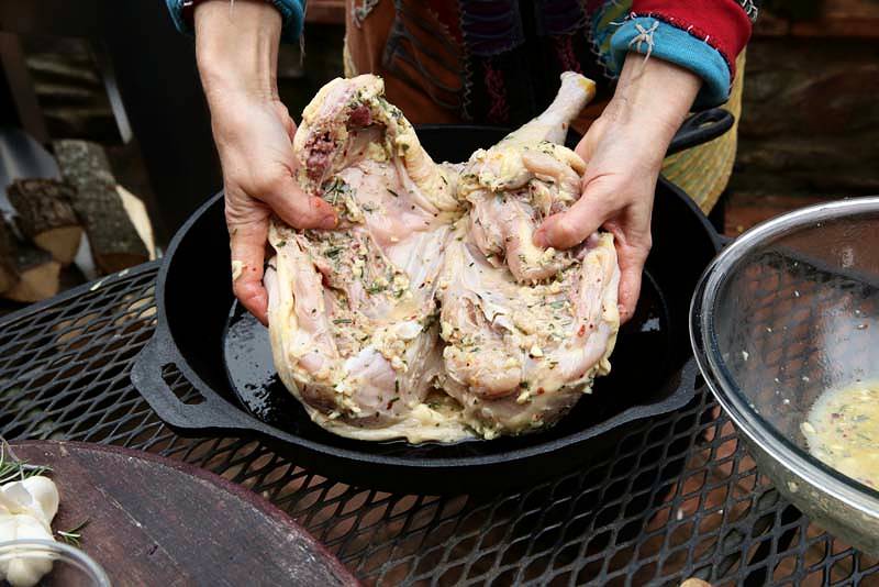 Image of Carefully set the chicken into the hot skillet, skin FIRST.