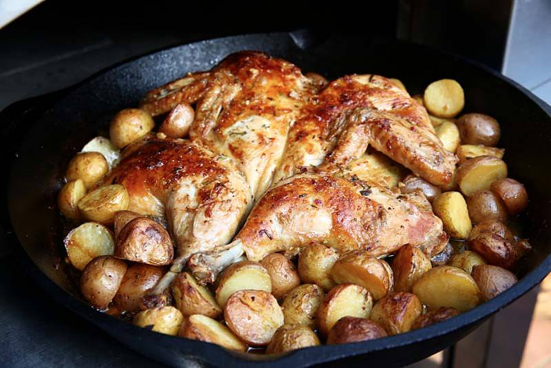 Image of Remove the lid and allow both potatoes and chicken to...