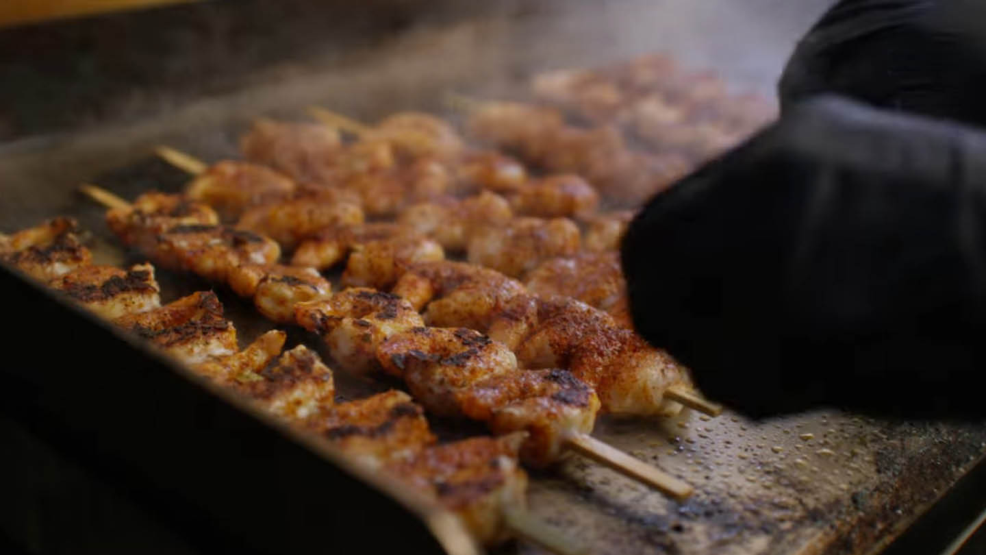 Image of Thread the shrimp onto skewers. Season on both sides with...