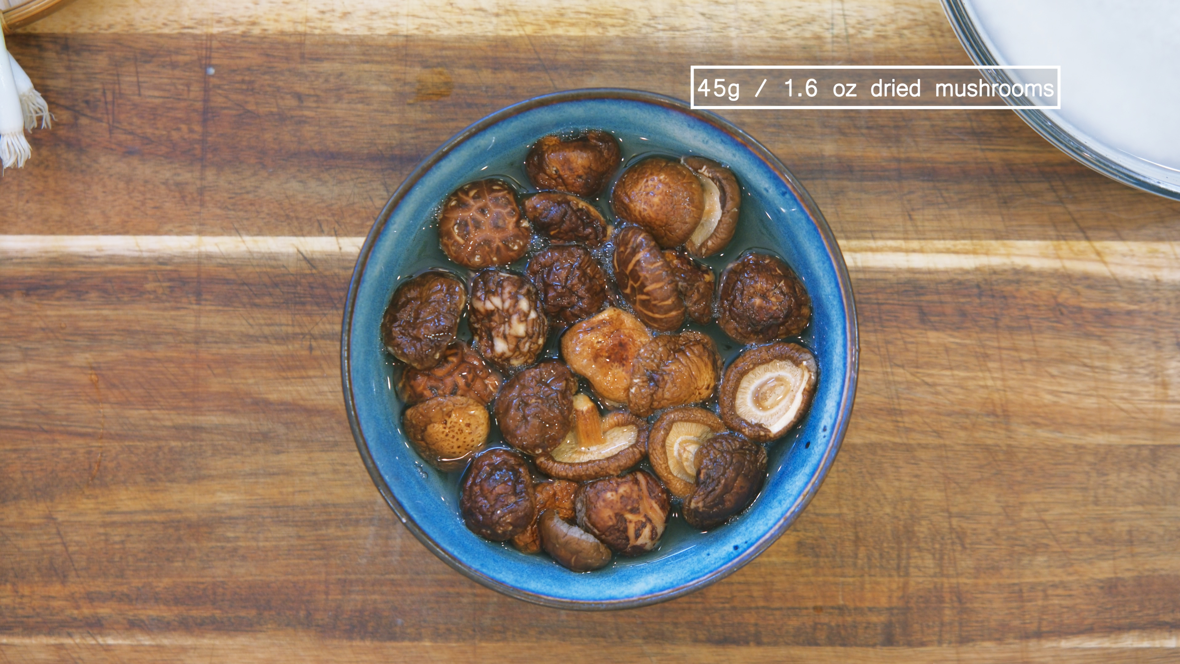 Image of Soak the glutinous rice and dried shiitake mushrooms in separate...