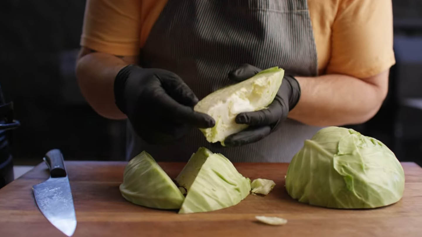 Image of Divide the cabbage into 6 wedges.