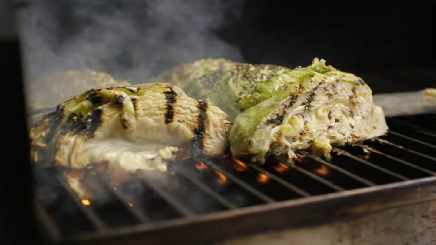 Image of Place the cabbage wedges on the GrillGrates and grill until...