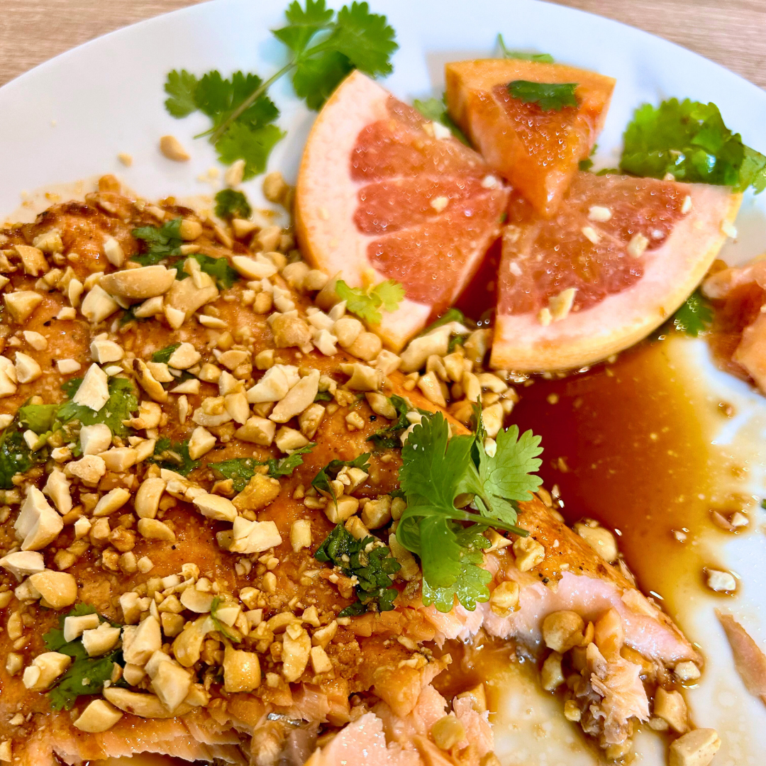 Image of Top finished salmon with a generous amount of crushed peanuts,...