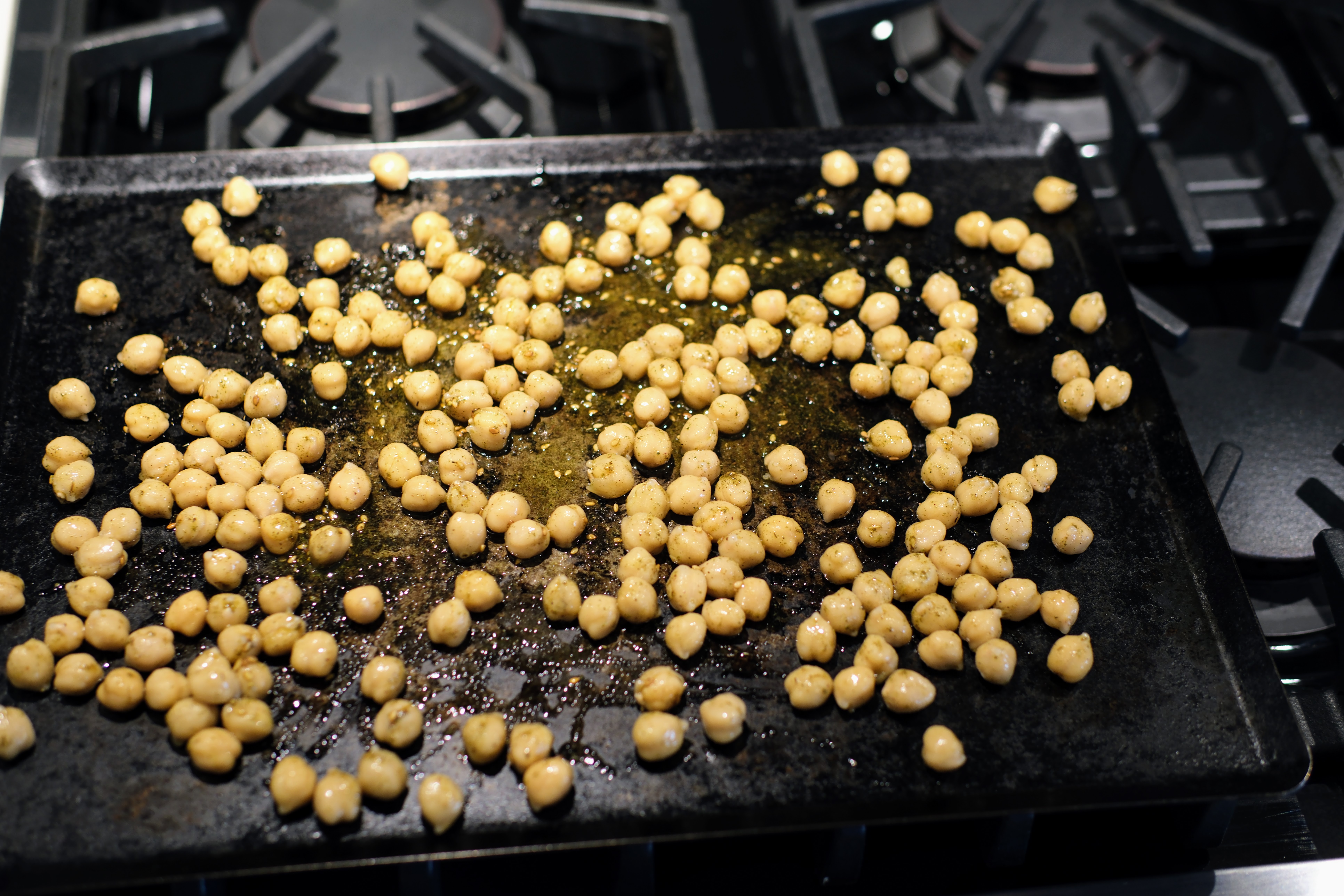 Image of Mix chickpeas, oil, and za’atar together.  You can use other...