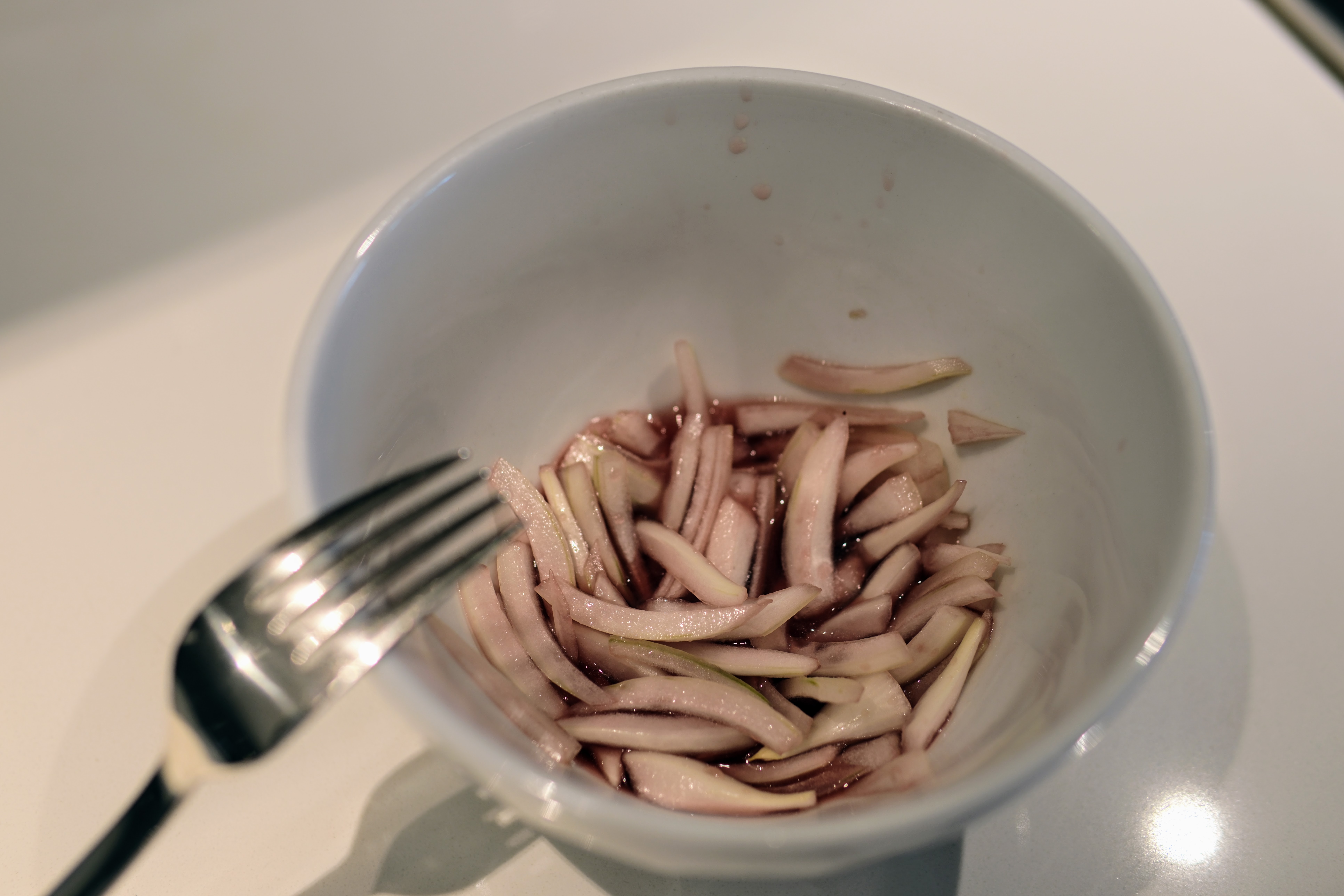 Image of Join both vinegars and thinly sliced onions in a small...