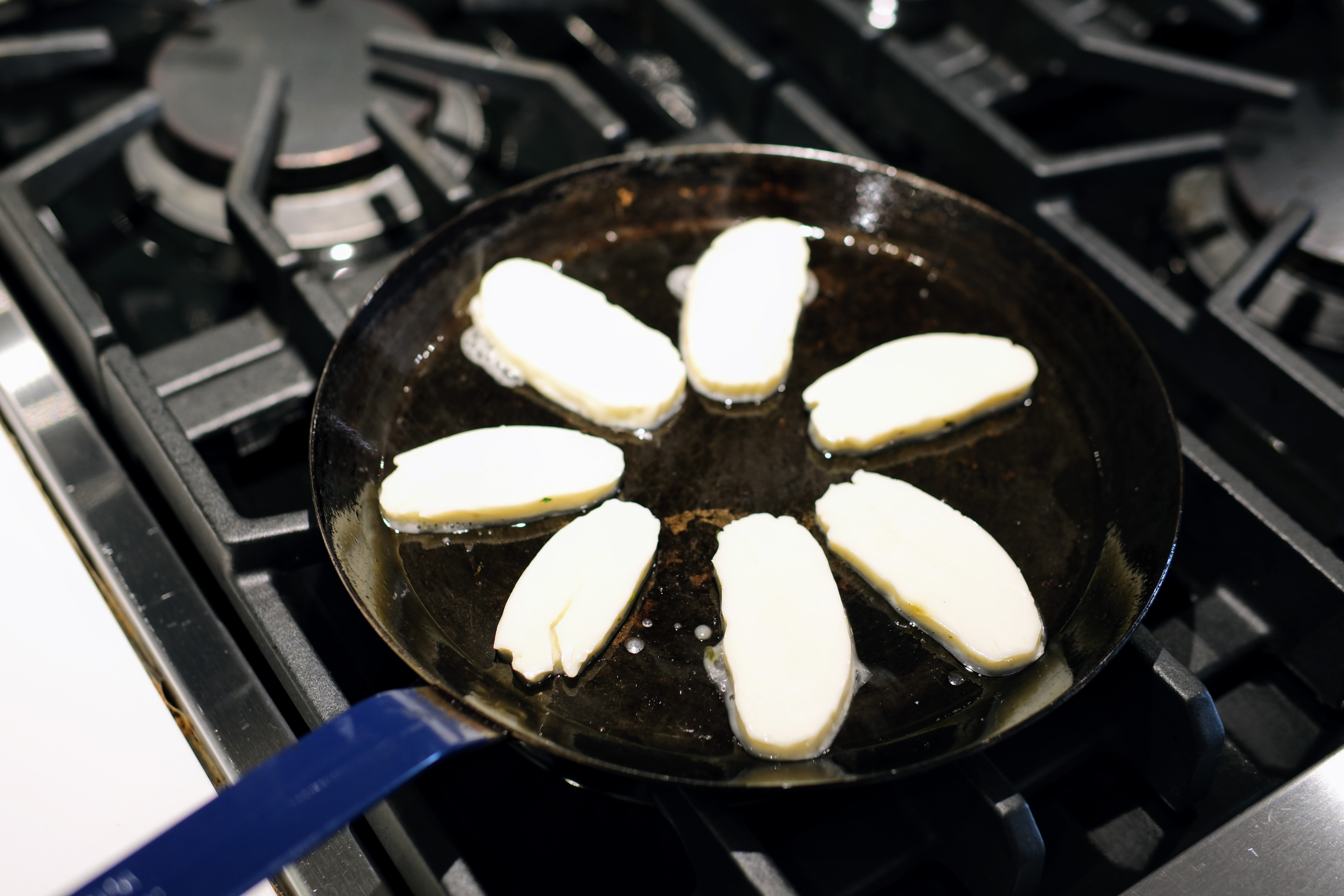 Image of Halloumi is often sold in plastic blocks with a small...