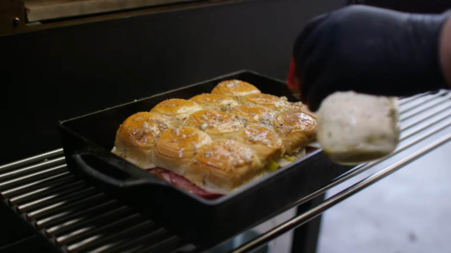 Image of Place the sliders in a Lodge Cast Iron Casserole Dish....