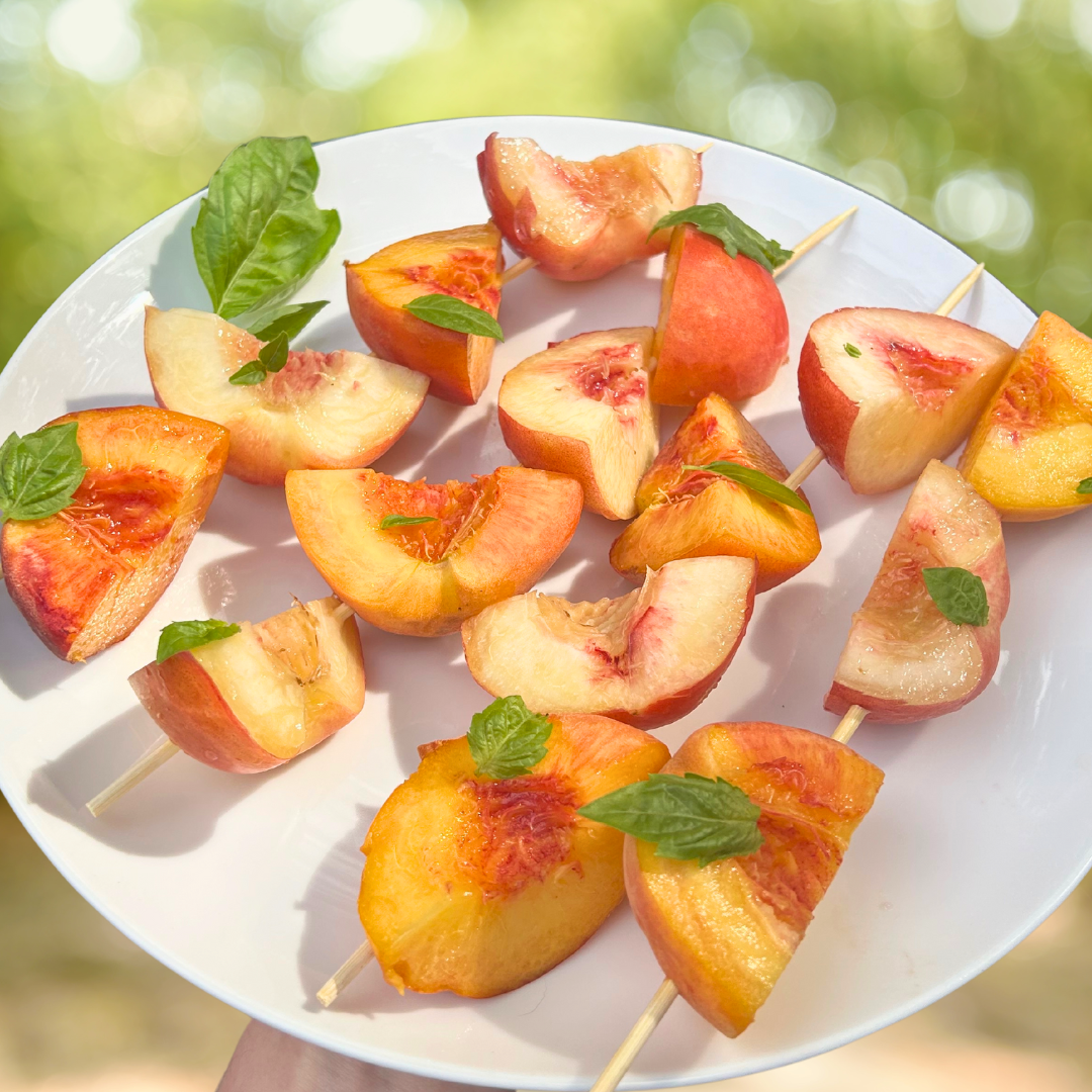 Image of Wash, dry, quarter, and remove pits. Skewer peaches and nectarines...