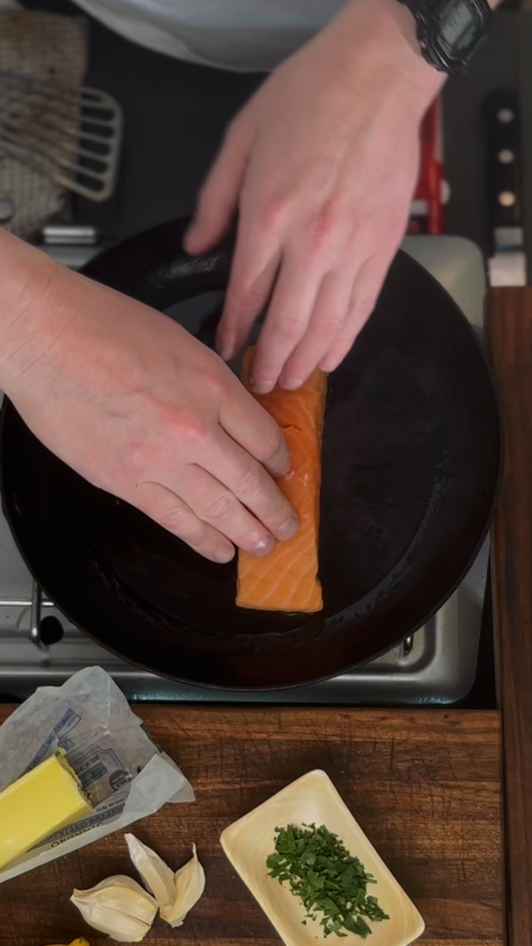 Image of Start searing the salmon from the flat side