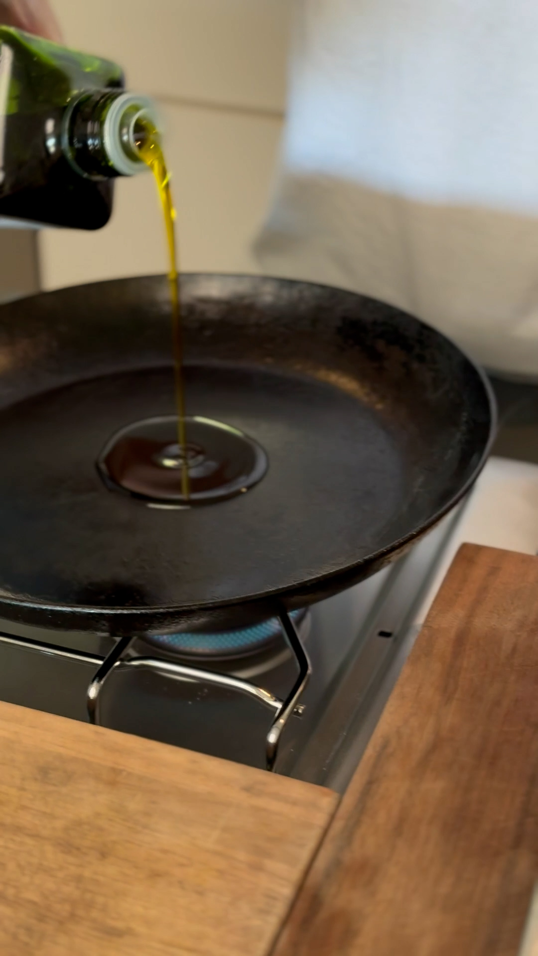 Image of Pour Olive oil into a heated pan