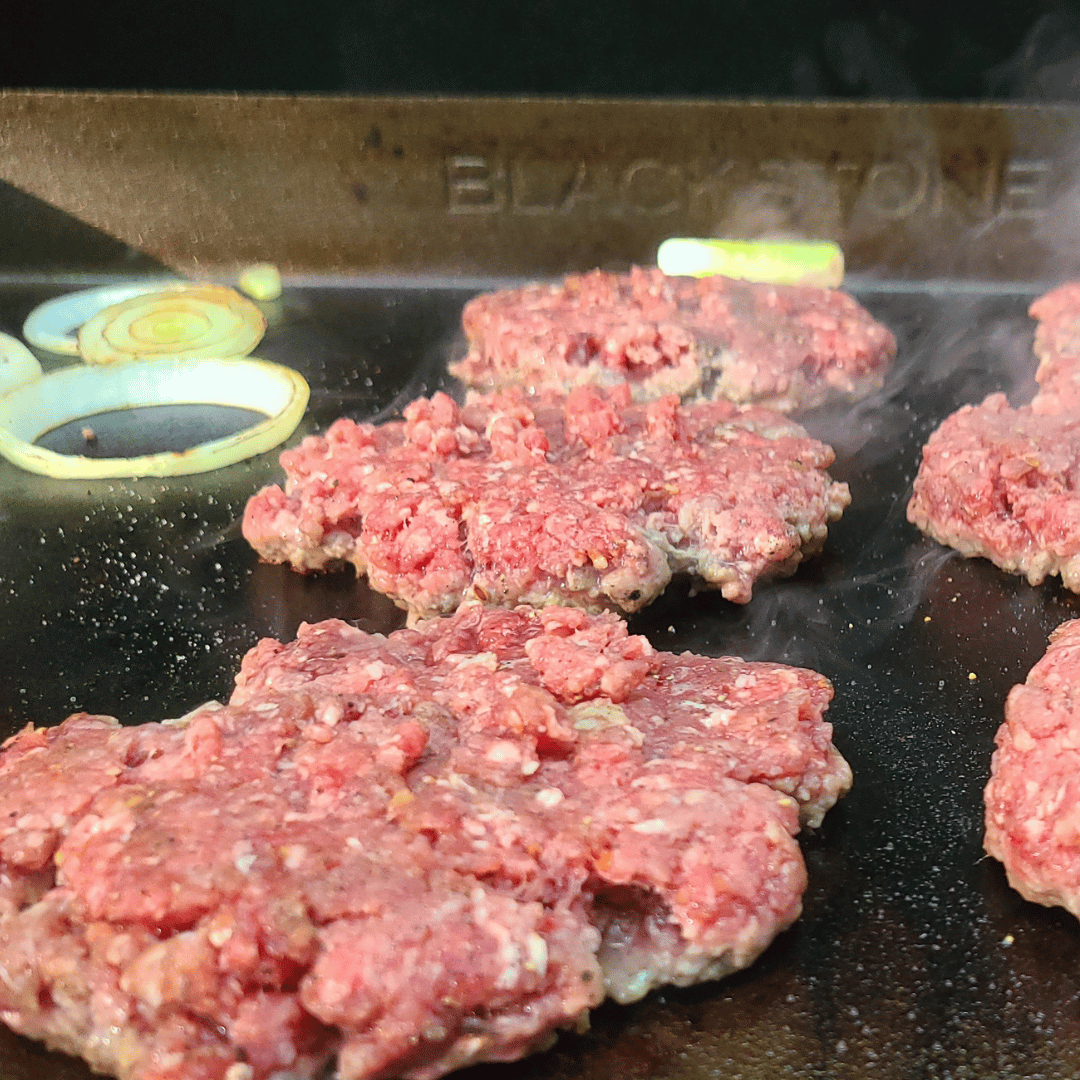 Image of Increase the griddle heat to high. Place the elk meat...