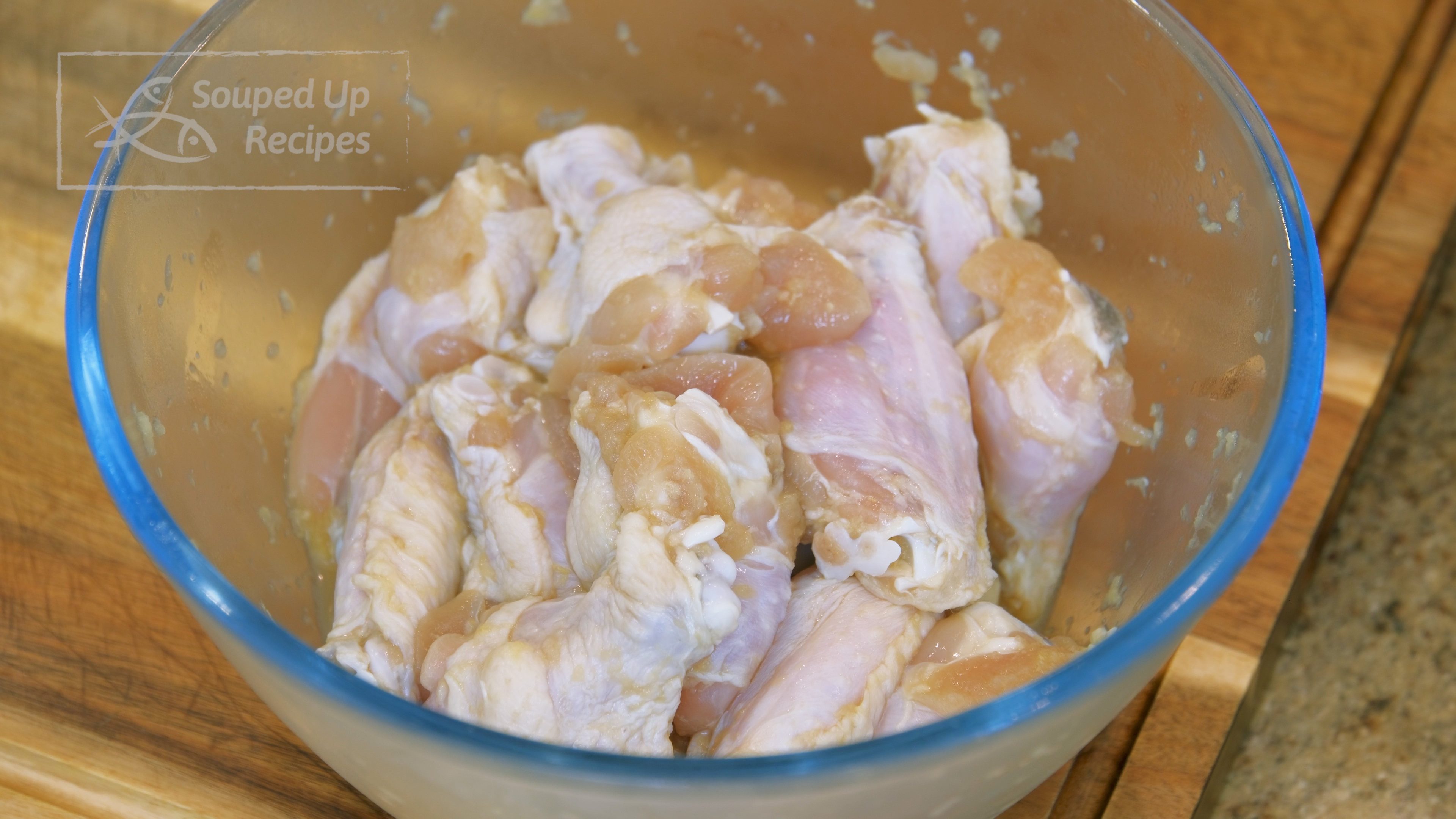 Image of By now, the chicken wings should be done marinading. Take...