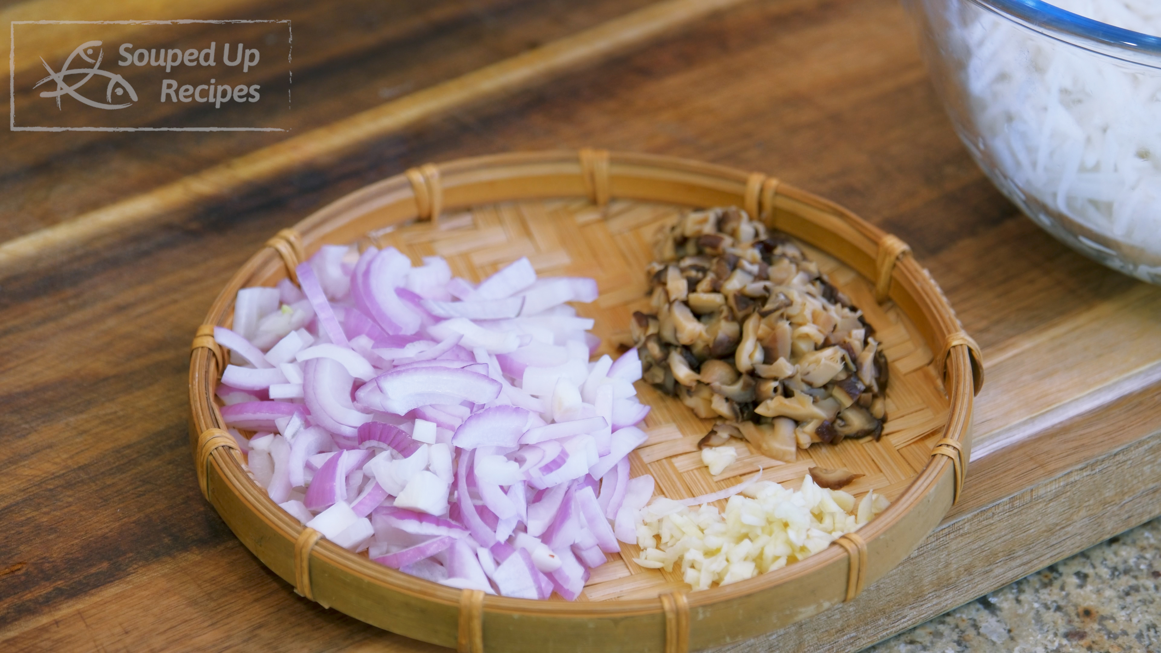 Image of While waiting, dice the shallot, garlic, the soaked shitake mushrooms,...