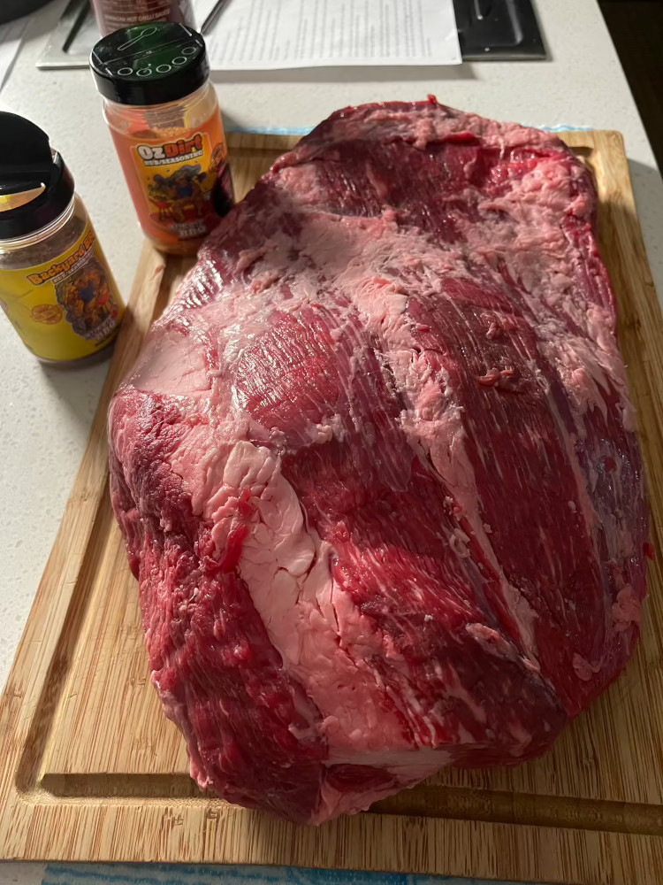 Image of To smooth out the brisket and remove all the flappy...