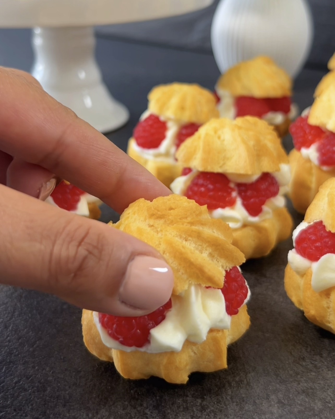 Image of Decorate the whipped cream with fresh raspberries.