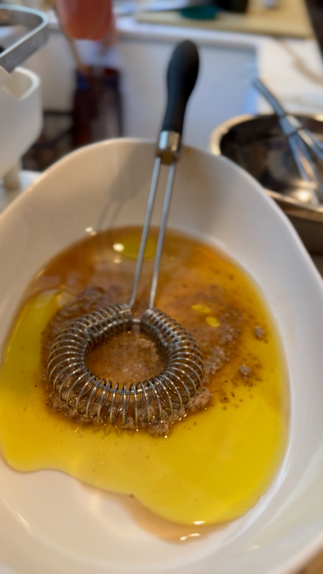 Image of In a bowl, whisk together 1/4 cup olive oil, 2...