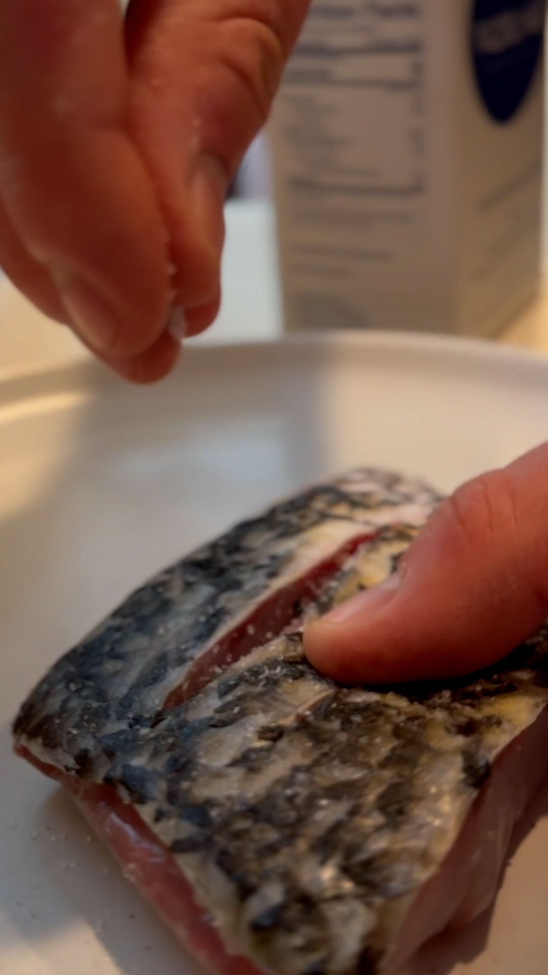 Image of Pat the barramundi fillet dry and season the skin side...