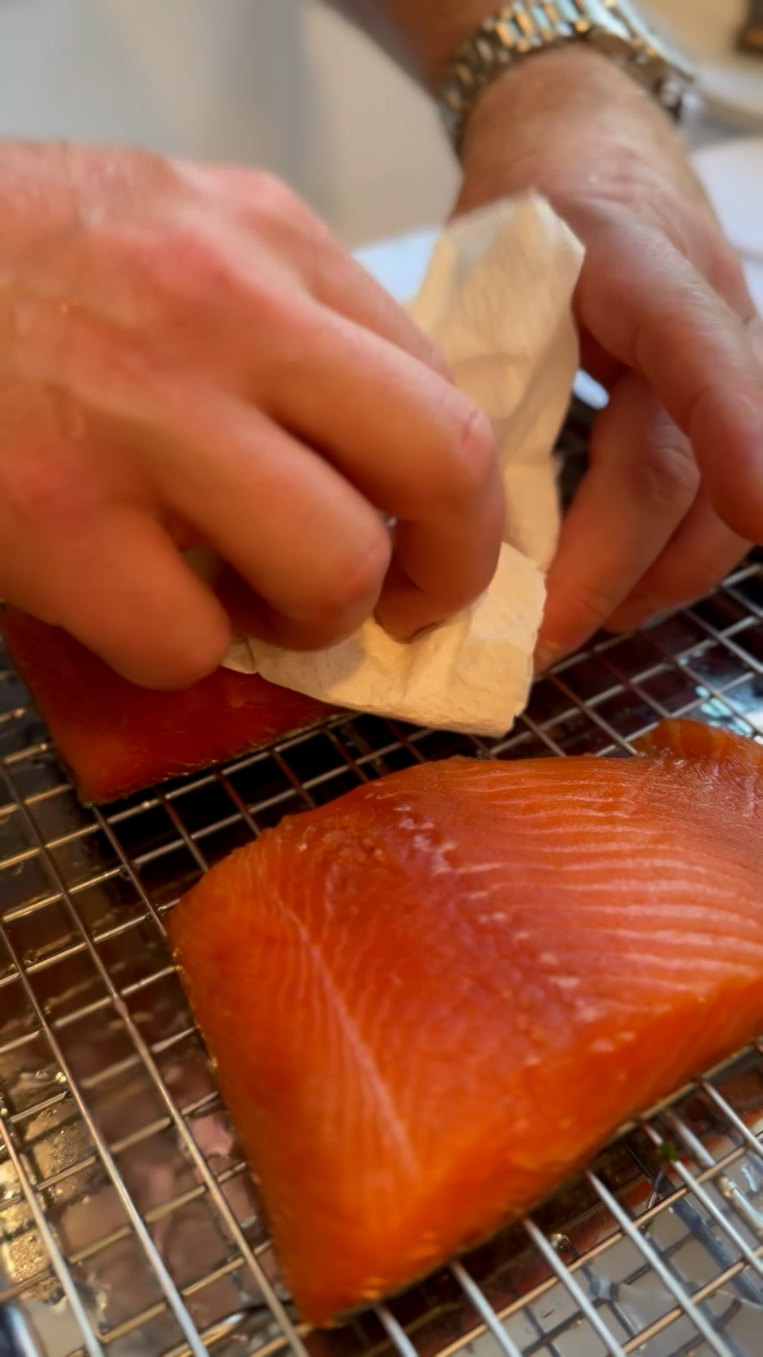 Image of Thoroughly dry the salmon with paper towels. 