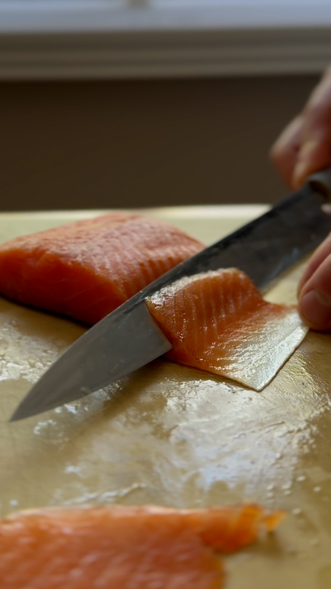 Image of Slice the salmon sashimi-style.