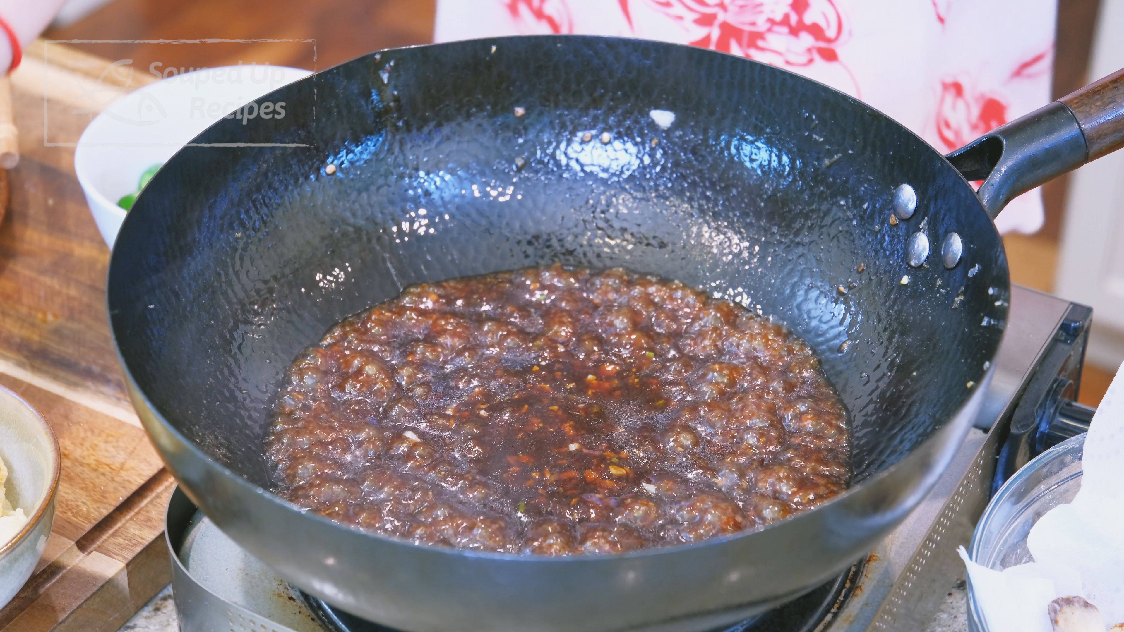 Image of Pour in the seasoning sauce and stir over low heat...