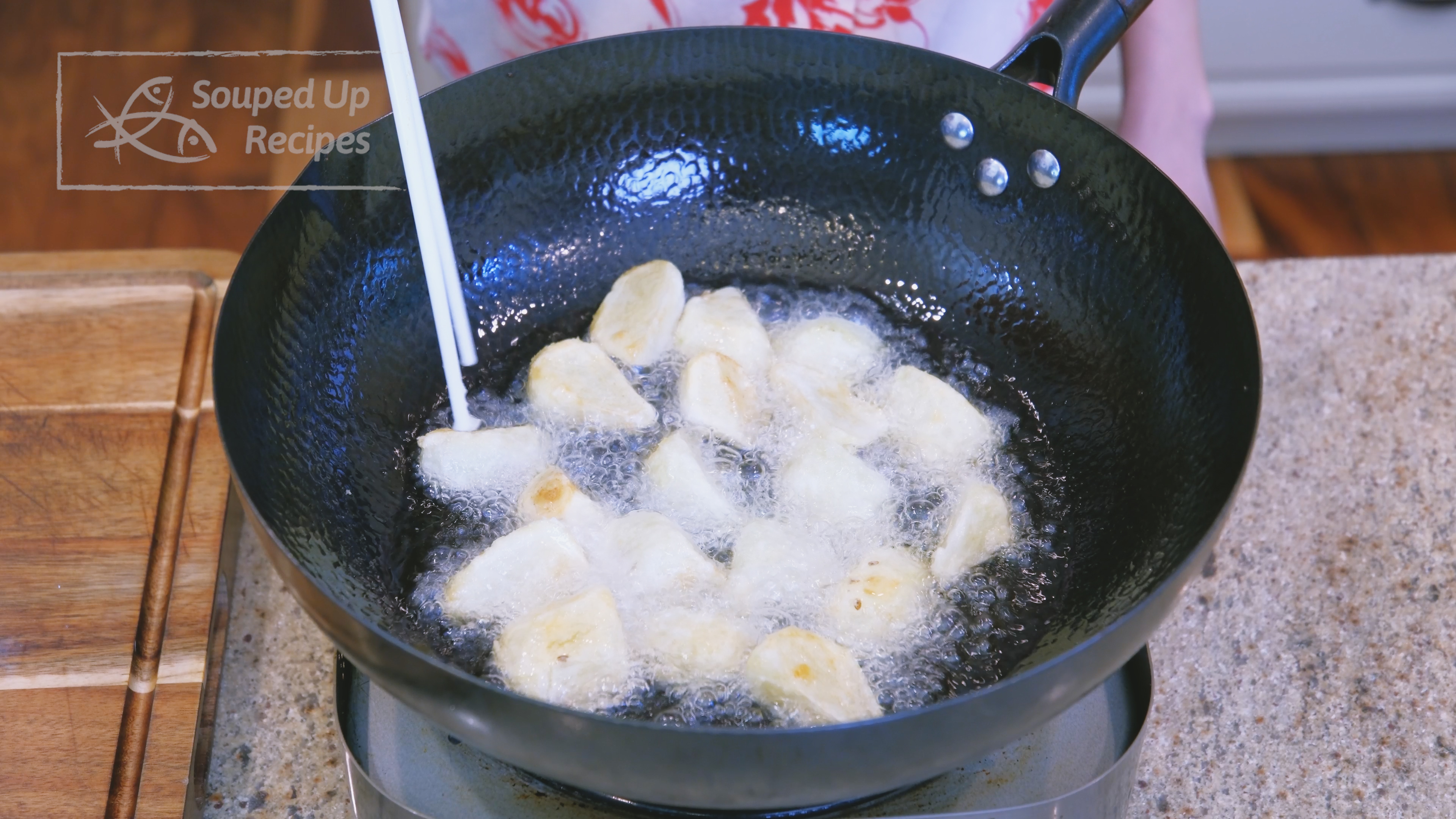 Image of Heat the oil in a wok to 360℉ / 182℃...