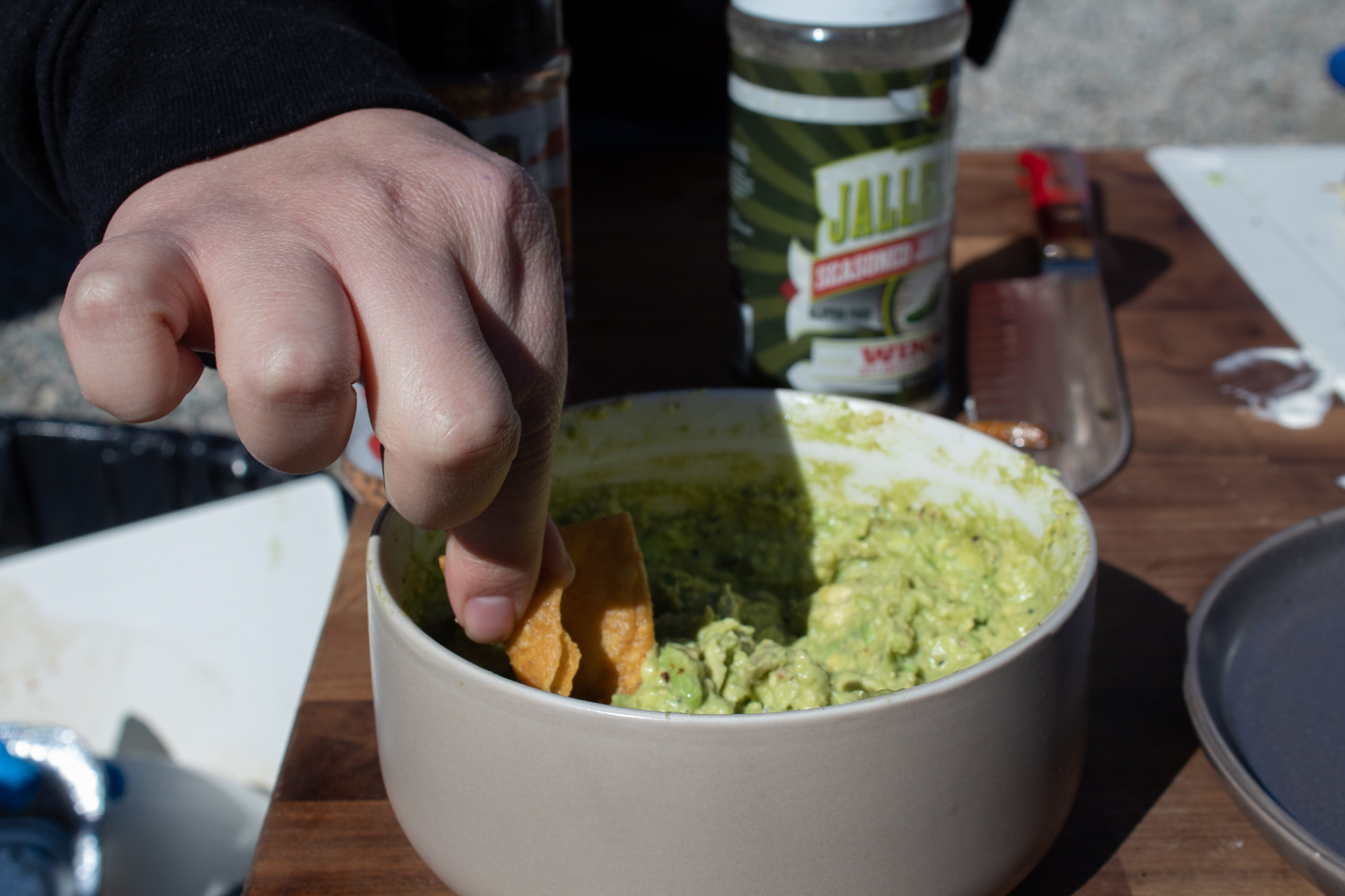 Image of Gentle fold the seasoning and the avocados together to create...