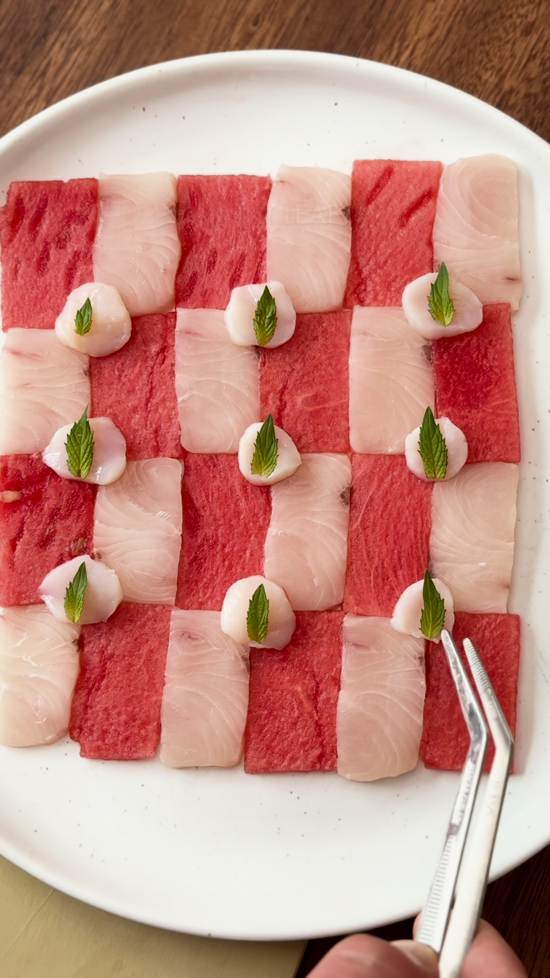 Image of Place the scallops throughout the plate with mint leaves