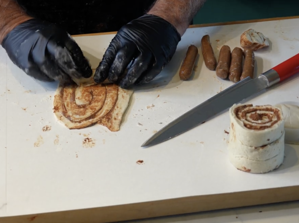 Image of Open canned cinnamon rolls and roll out flat