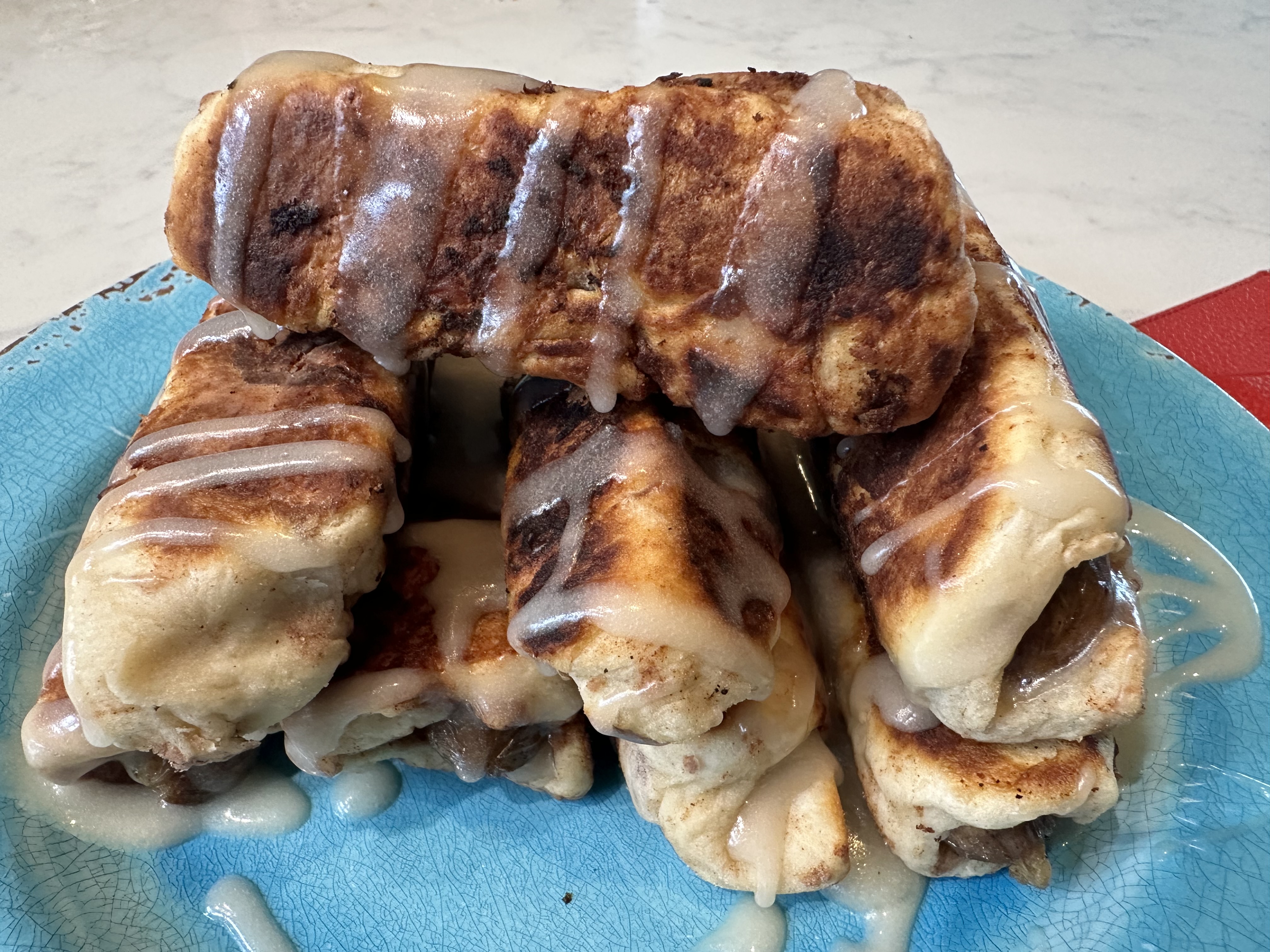 Image of Once cooked, then plate and top with icing and serve