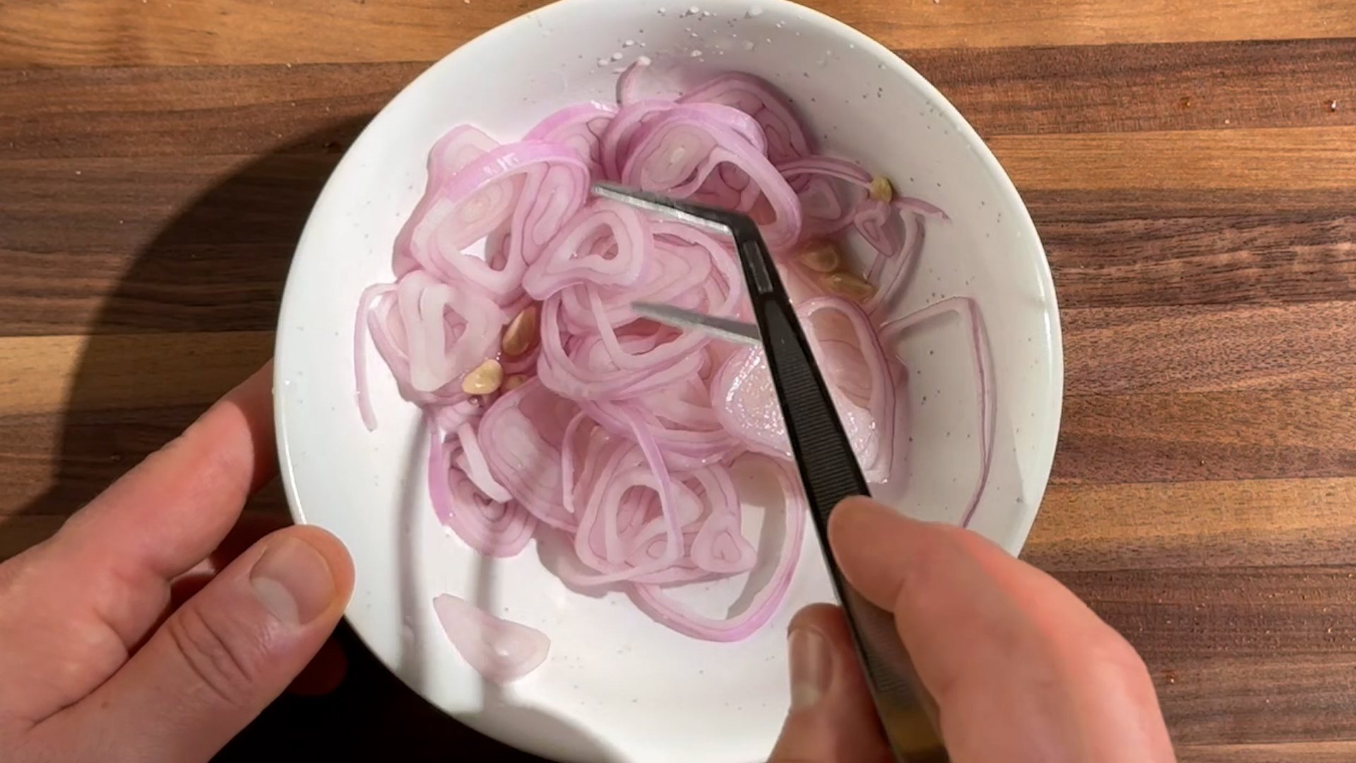 Image of Pickle the Shallot: Place the sliced shallots into a small...