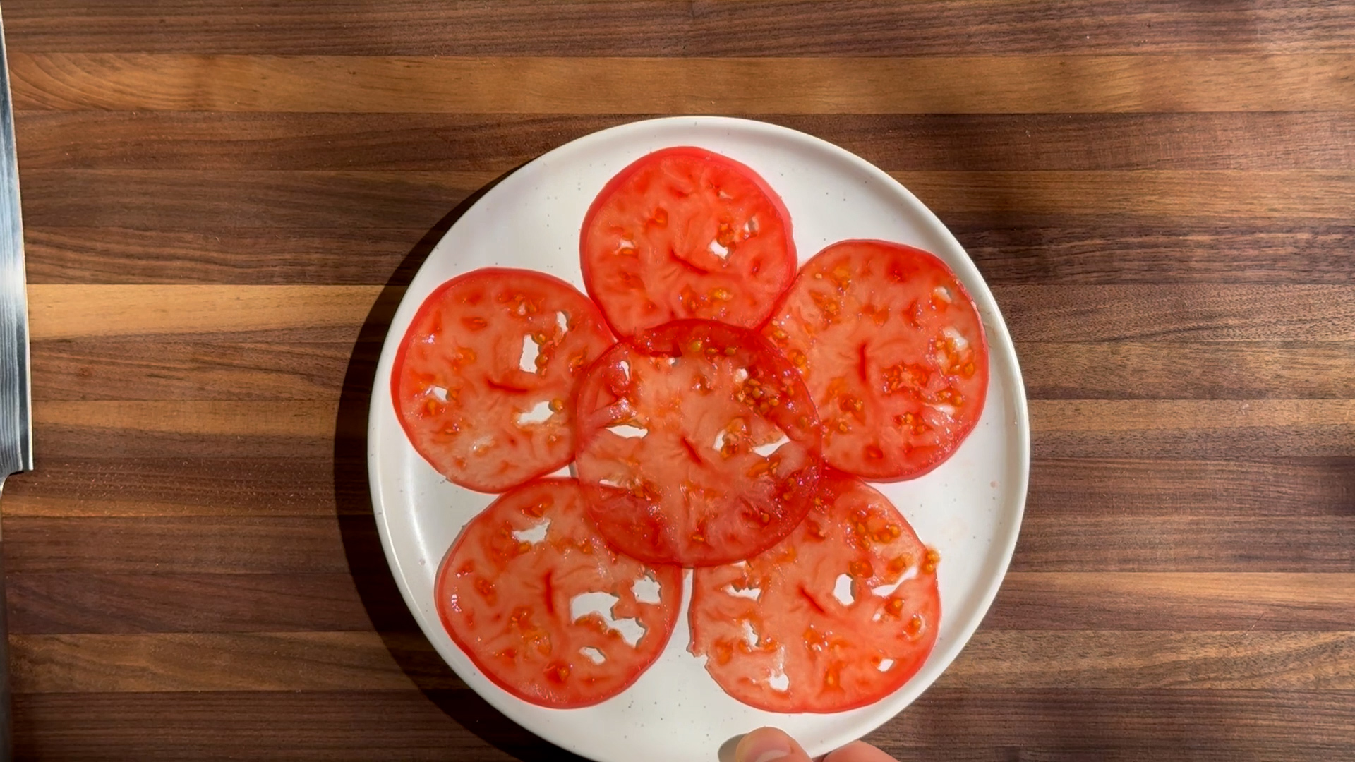 Image of Arrange on the Plate: Arrange the tomato slices on your...