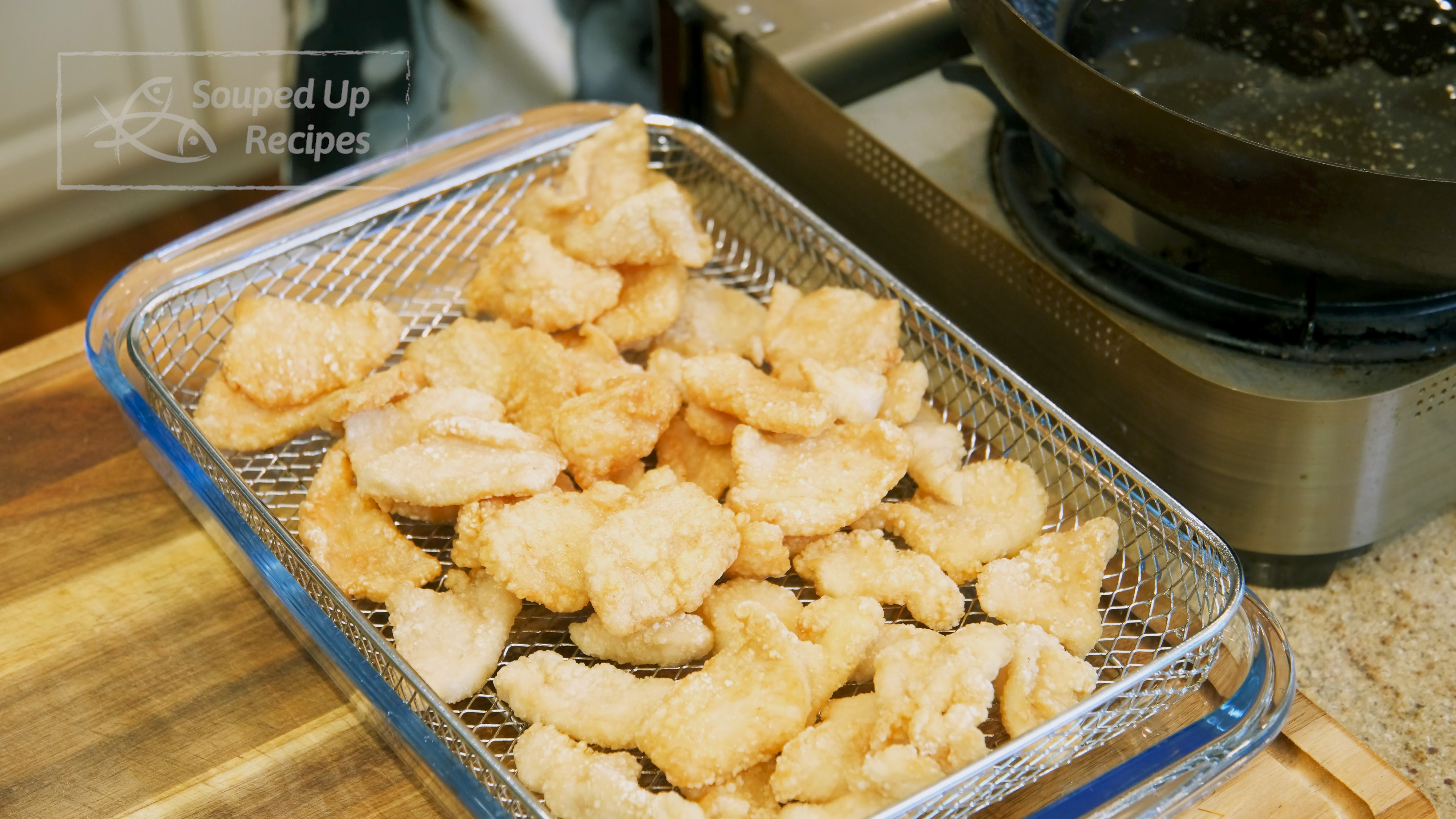 Image of Once the chicken is done frying, remove from the oil...