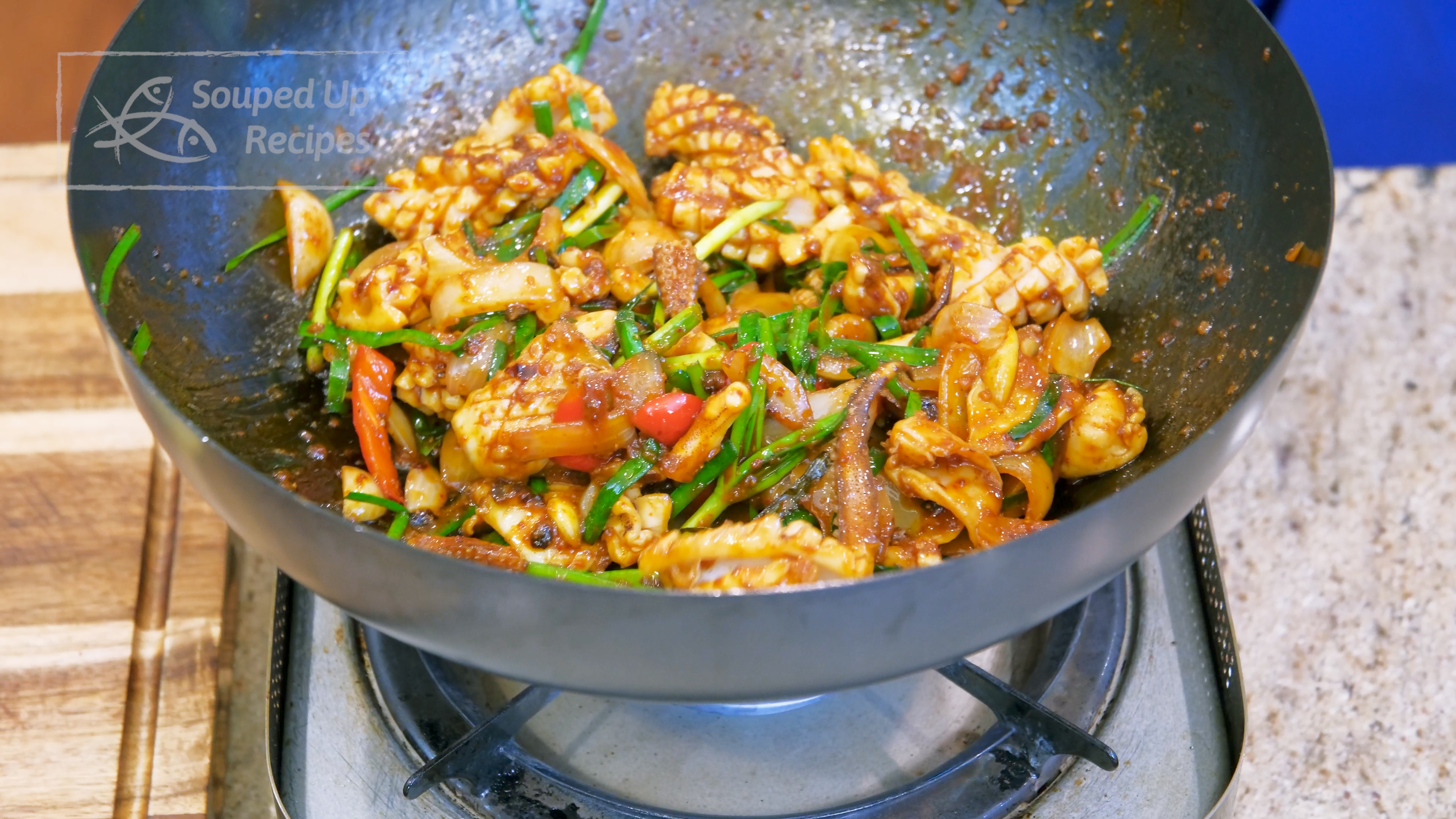 Image of Add the blanched squid. A perfectly stir fry squid must...