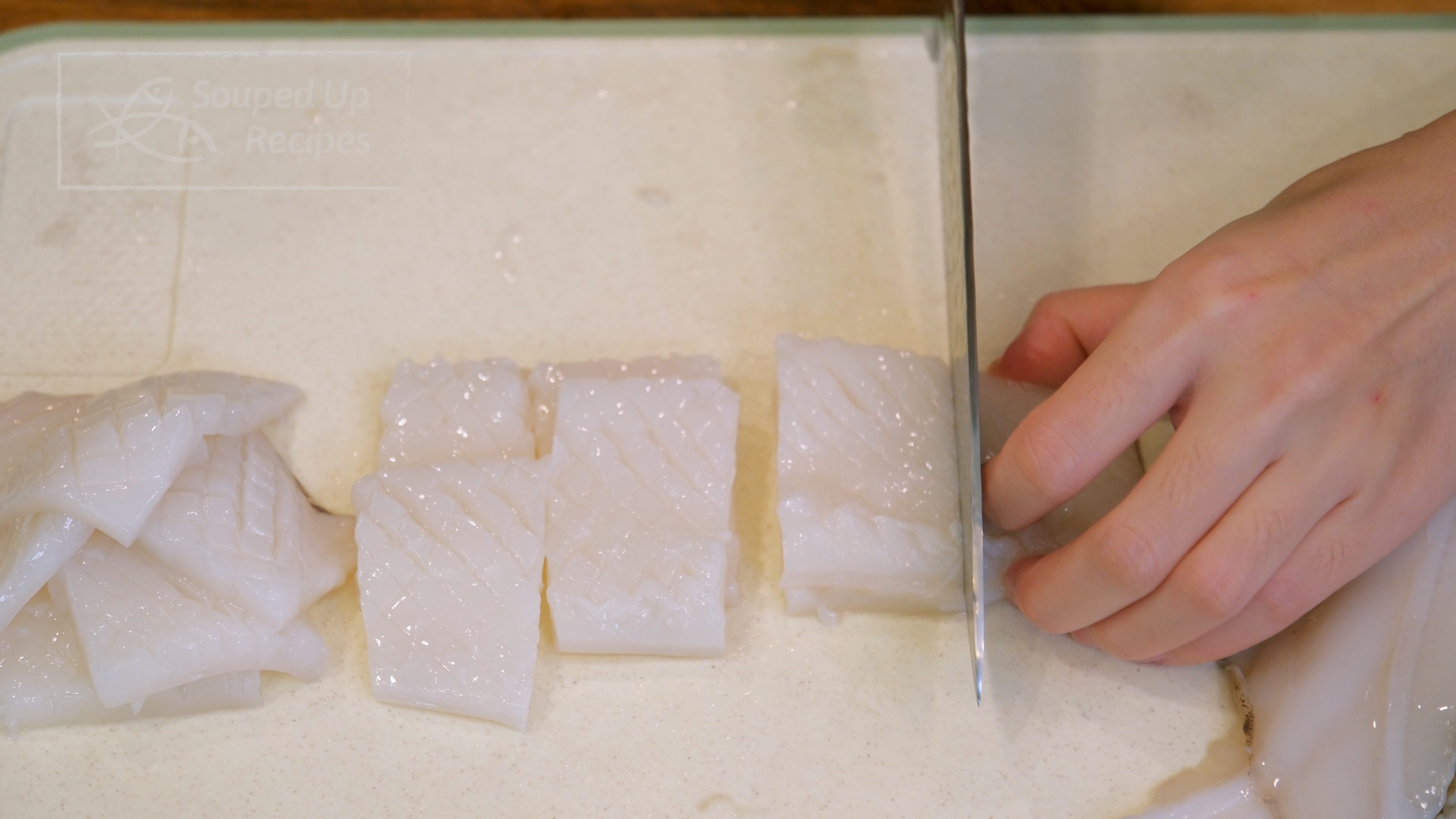 Image of Cut the scored squid into 1.5-inch rectangular pieces. Do the...