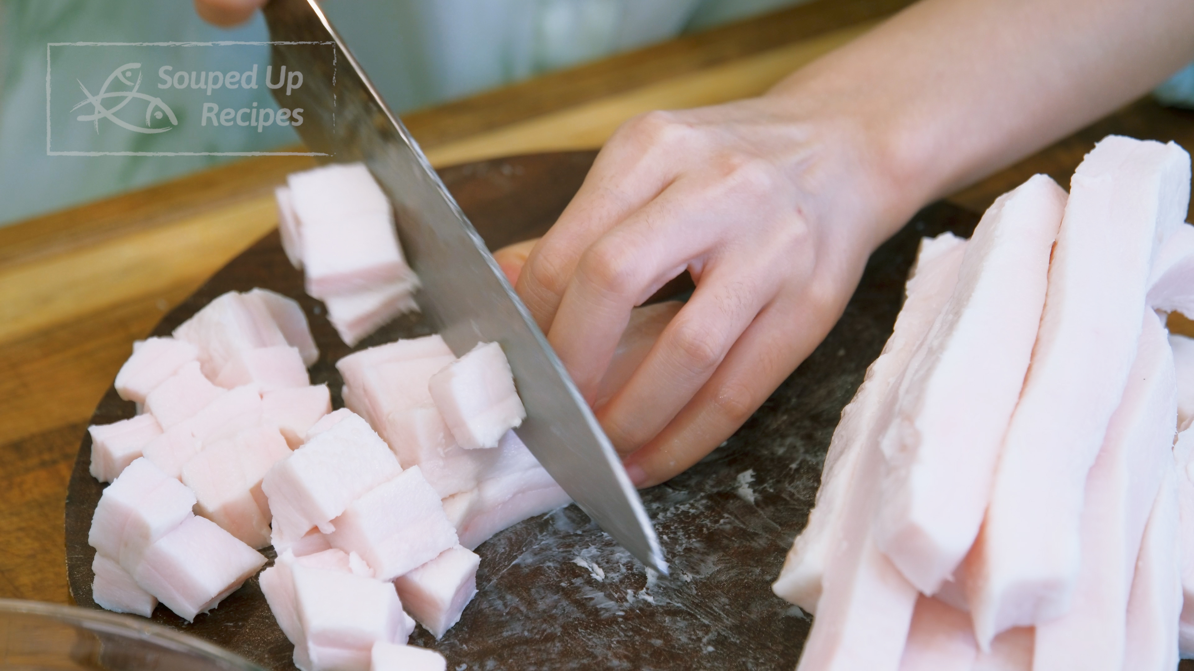 Image of Cut the pork fat into bite-size pieces. If you see...