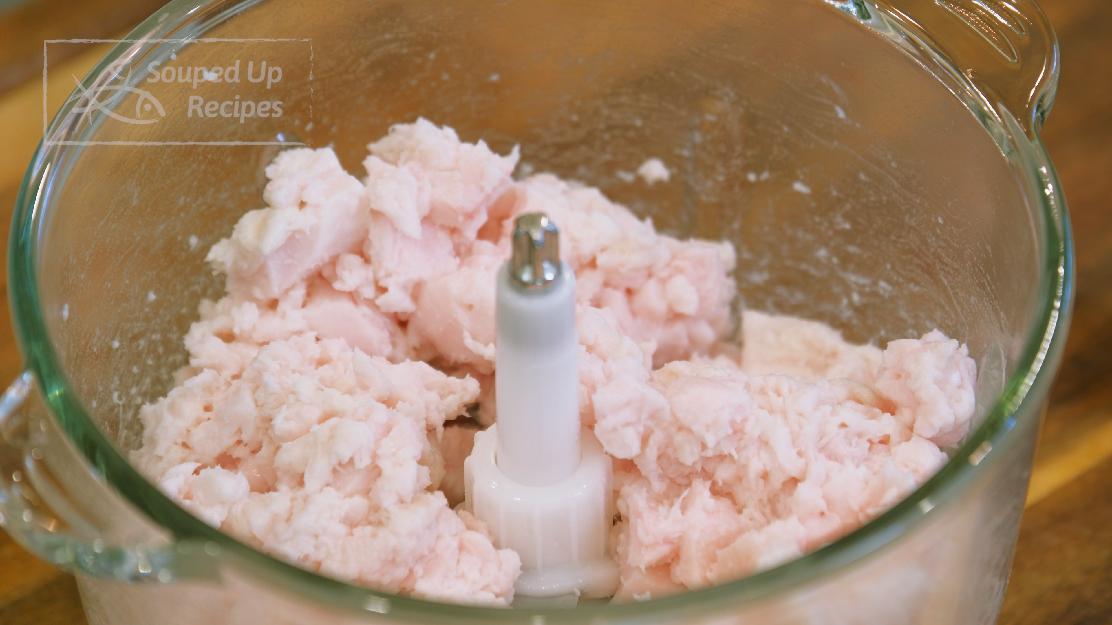 Image of Add the pork fat into a food processor and chop...