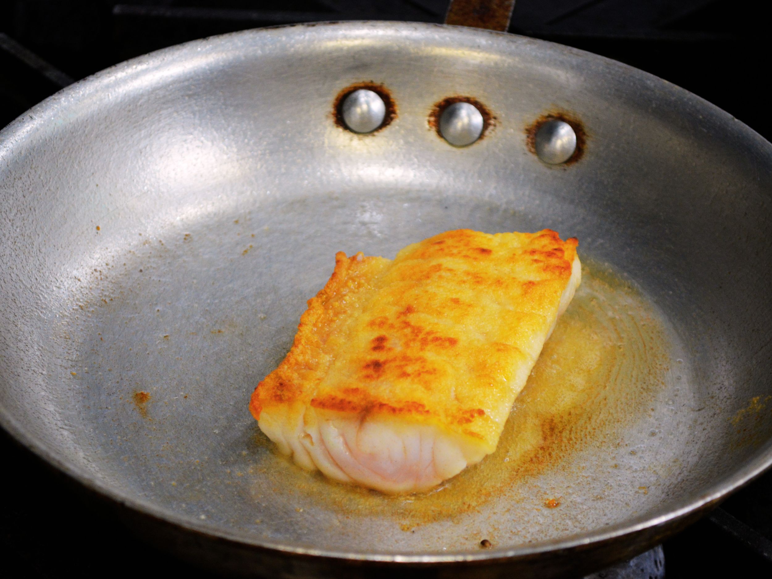 Image of Dust Grey Tilefish in flour and pat off the excess,...