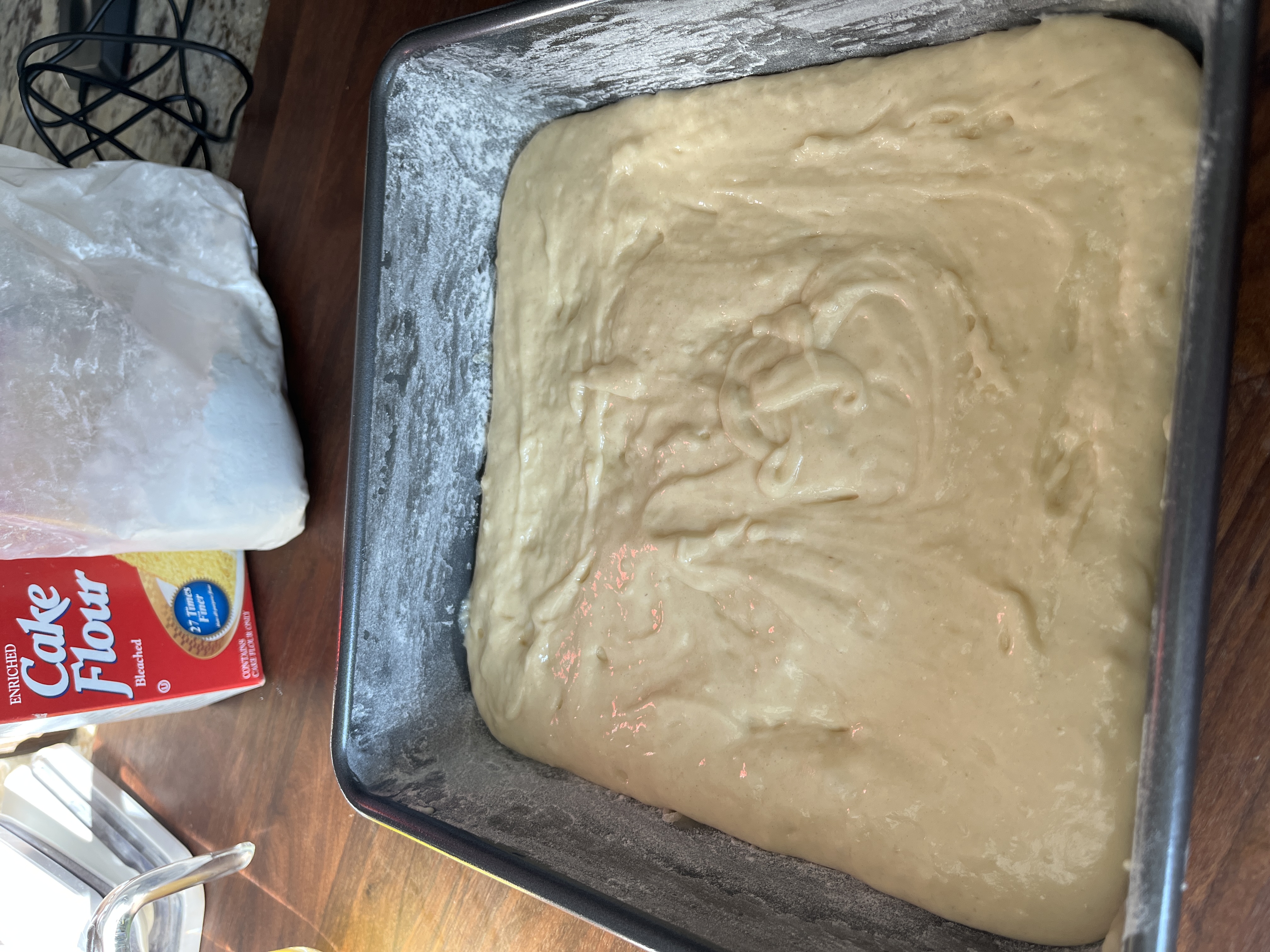 Image of Spread batter evenly into prepared pan. Break apart the crumb...