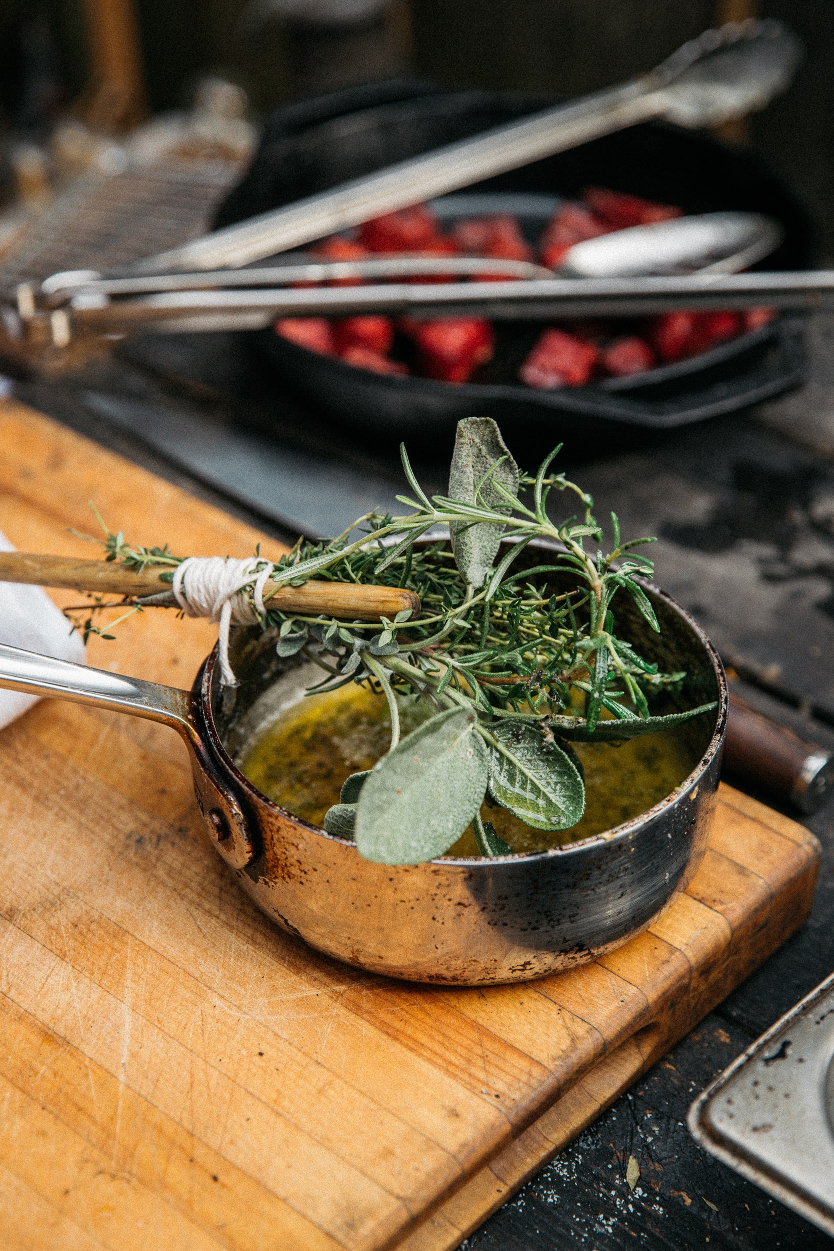 Image of Prepare the Herb Basting Brush: Lay out 4-5 long sprigs...