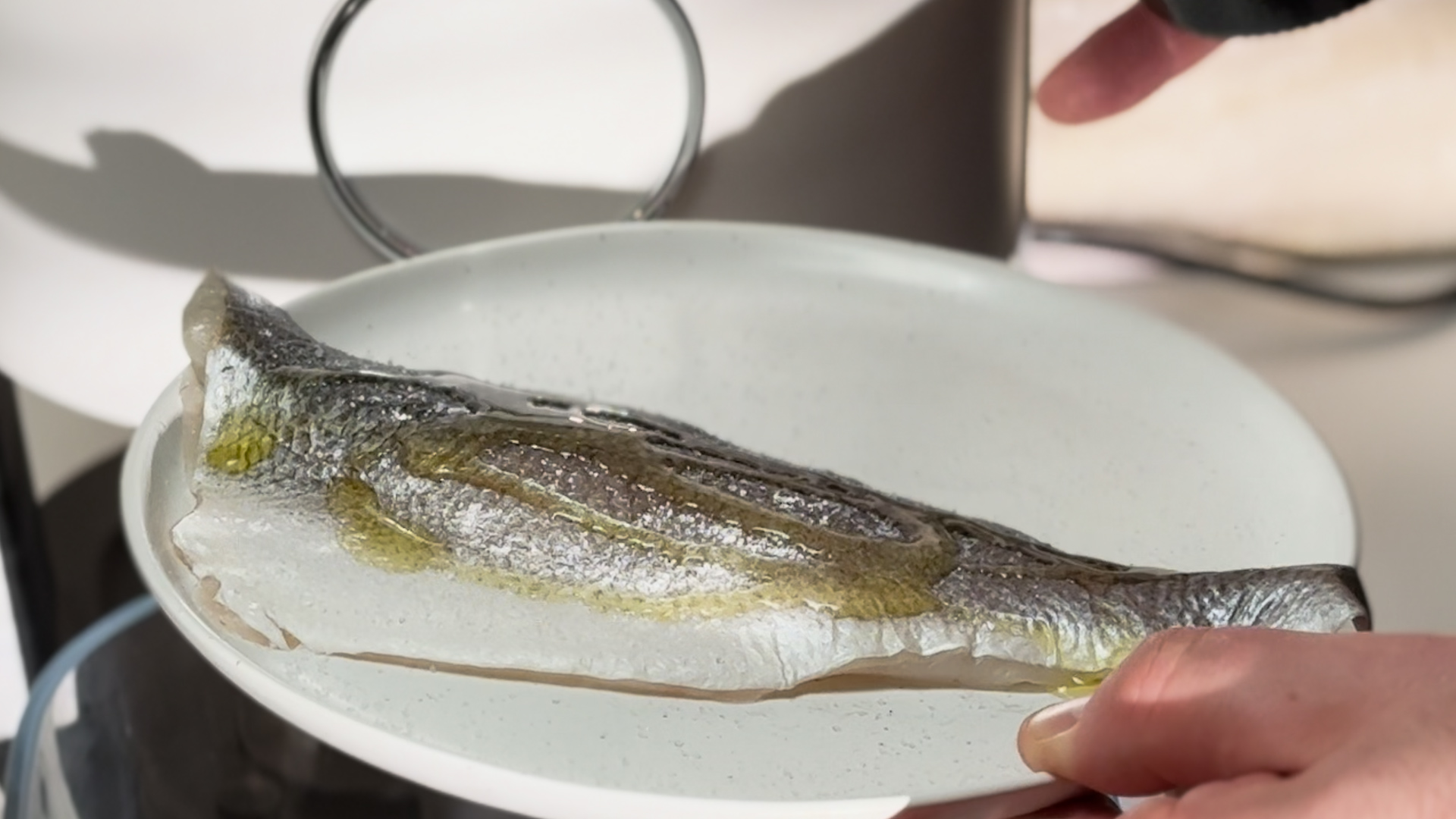 Image of Prepare the branzino: Open the Seatopia branzino package after properly...