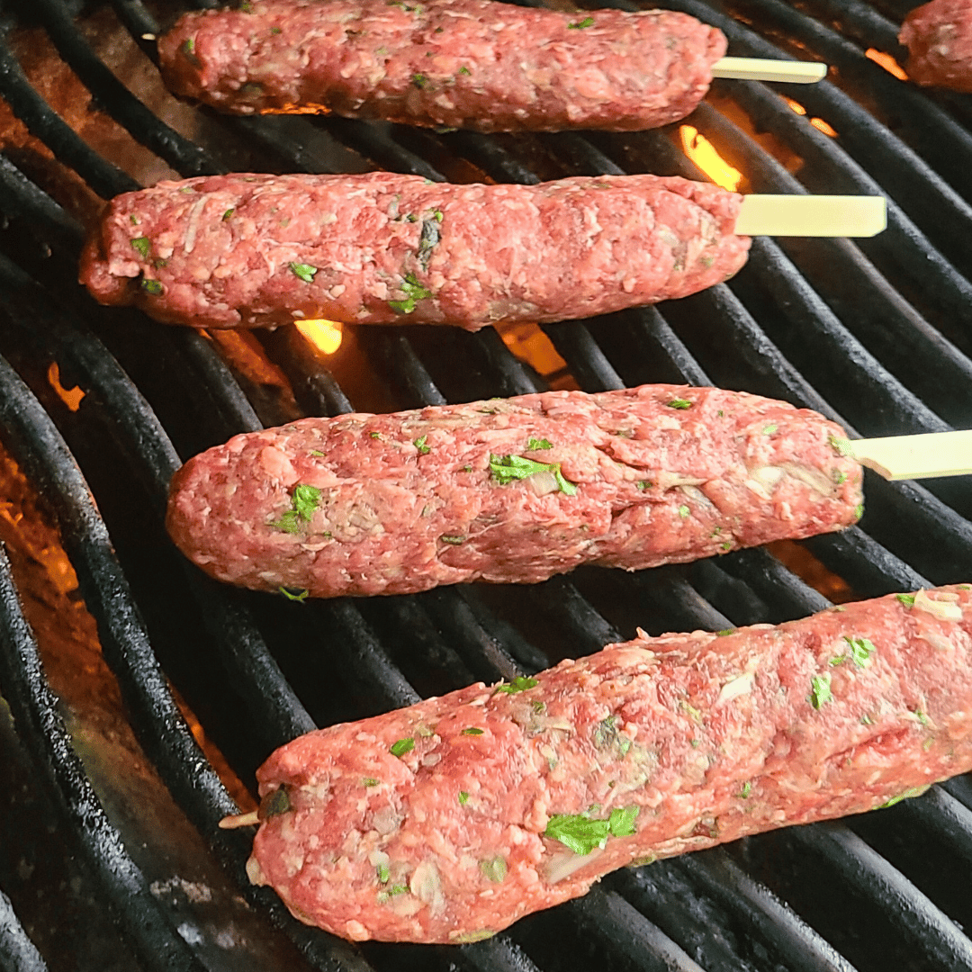 Image of Carefully place each skewer on the preheated and greased grill....