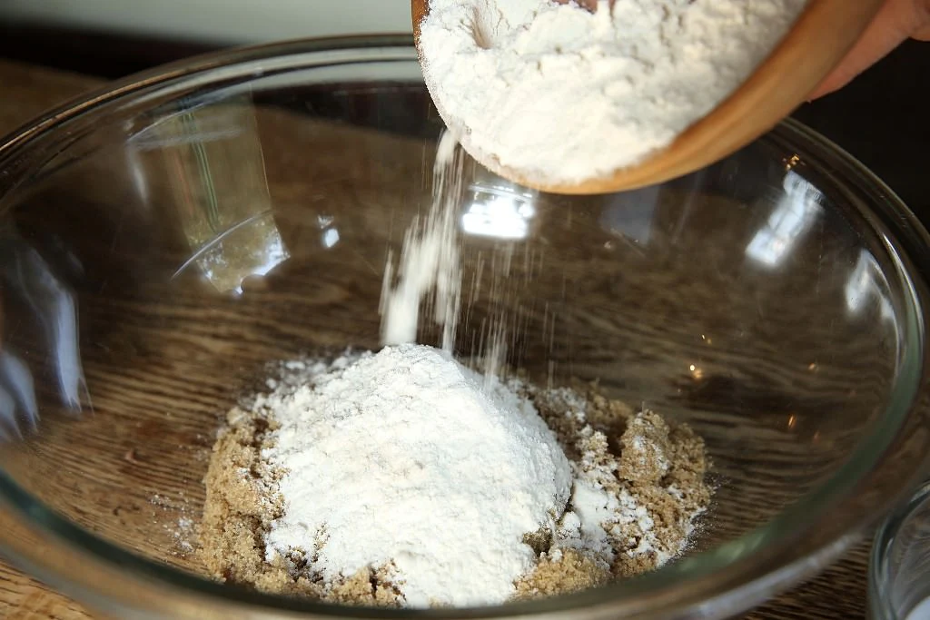 Image of Next measure 1/2 cup flour and add it to the...