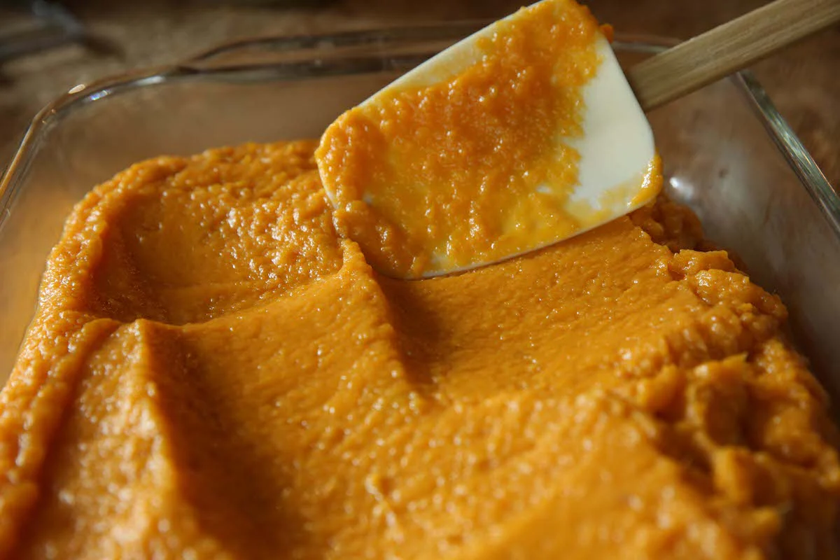 Image of Spread the sweet potatoes evenly into the dish.