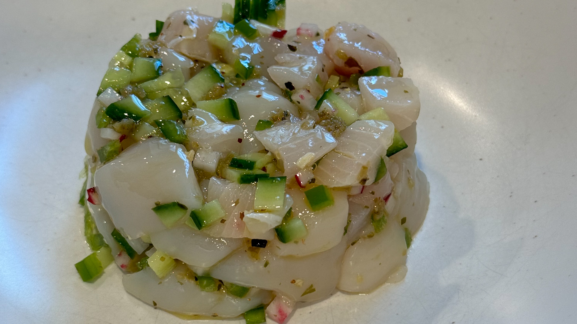 Image of Plate the Tartare: Cover the ramekin with a plate, then...