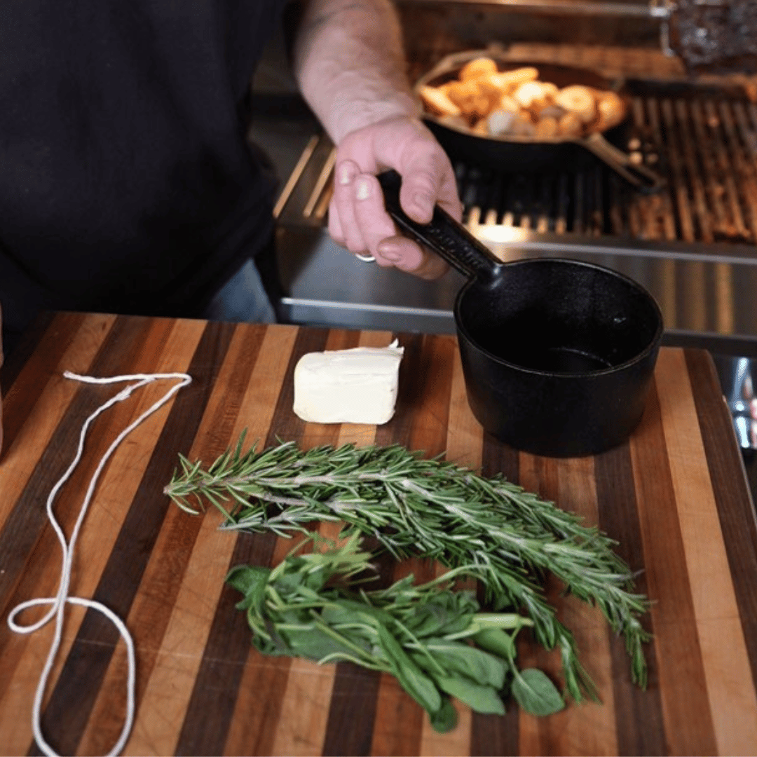 Image of Baste: Mix melted butter with rosemary and sage. 